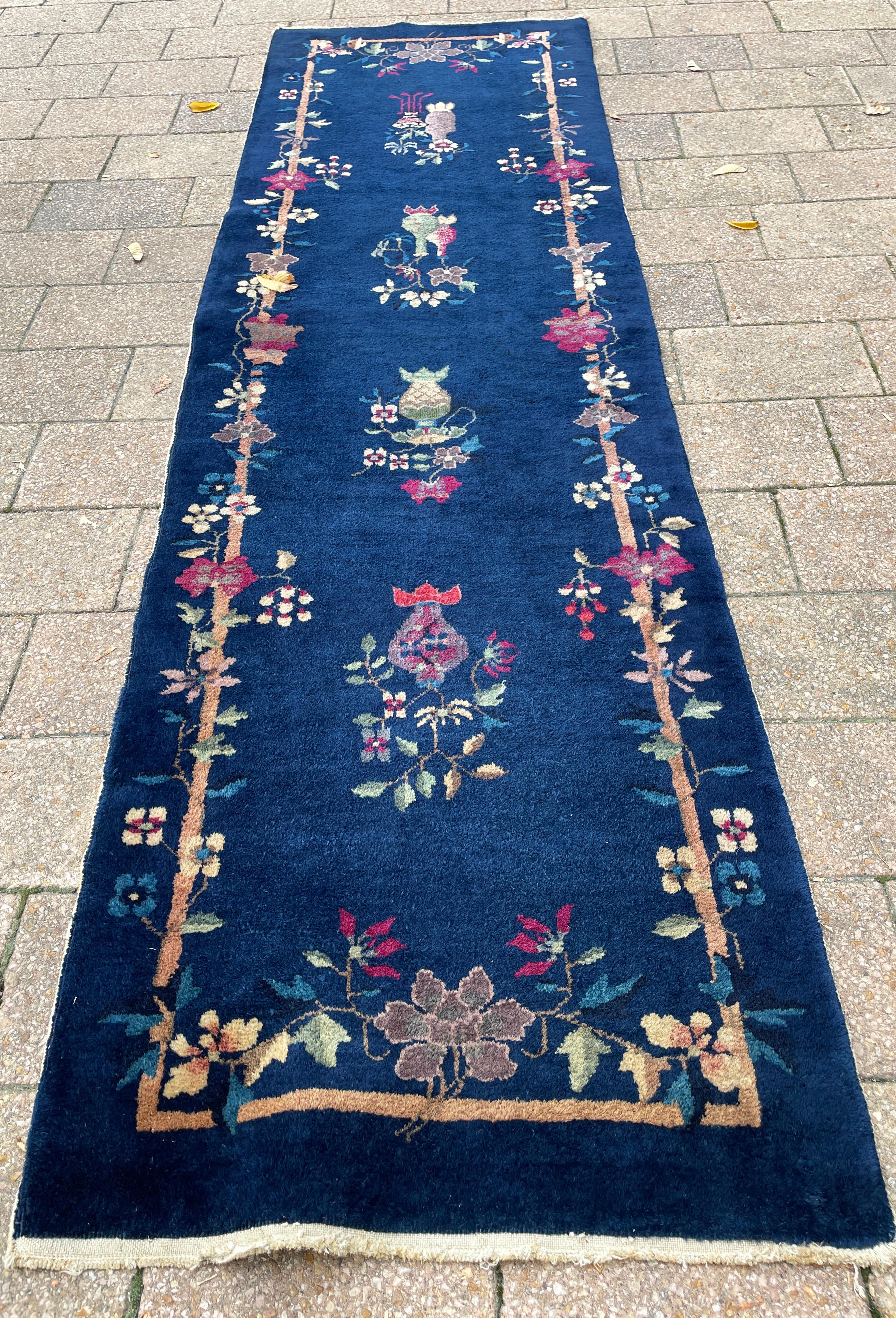 Step into a world of rare elegance with our exquisite Art Deco Runner, a true marvel from the 1920s that carries the allure of a bygone era. Crafted with precision in China, this runner is a testament to the impeccable craftsmanship of its time.
