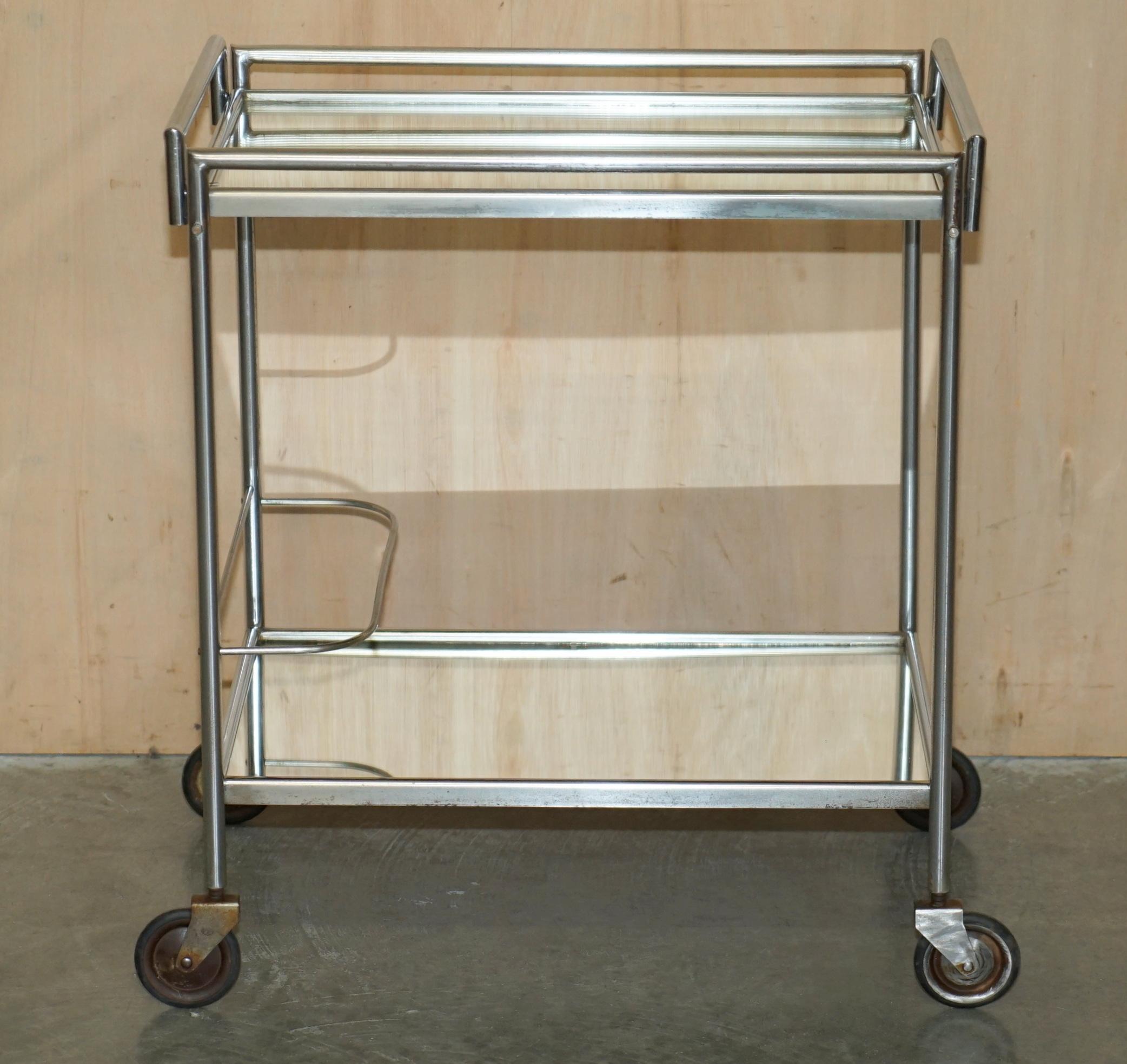 Royal House Antiques

Royal House Antiques is delighted to offer for sale this absolutely stunning circa 1920's Glass and Chrome Art Deco French drinks / snacks serving trolly 

Please note the delivery fee listed is just a guide, it covers within