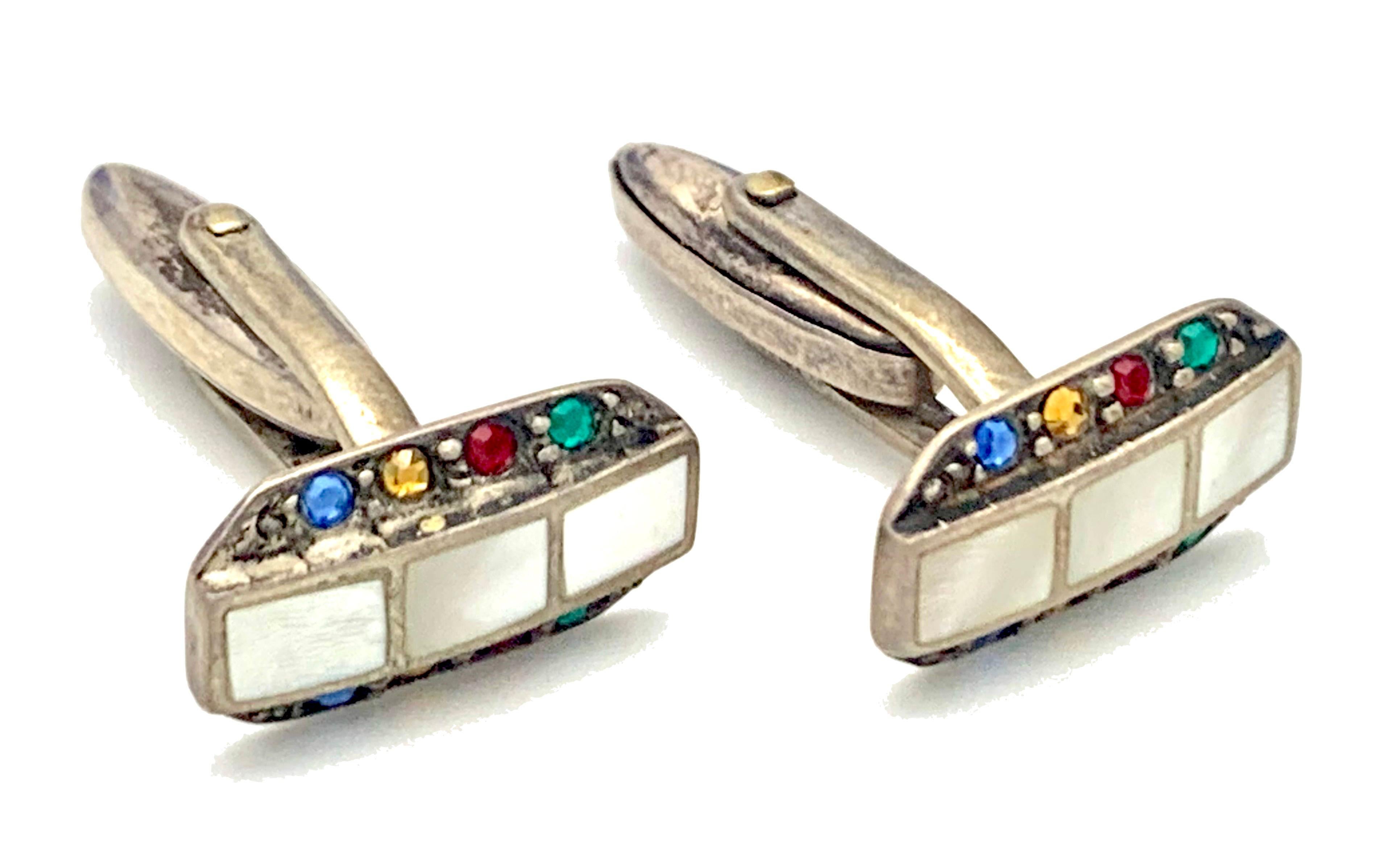 These charming colourful octagonal cufflinks embody the spirit of At Deco, stylishness, strong design, bright lights, a fast and colourful live, the roaring twenties. Geometric design with a playful twist.
In the centre of each cufflink  three