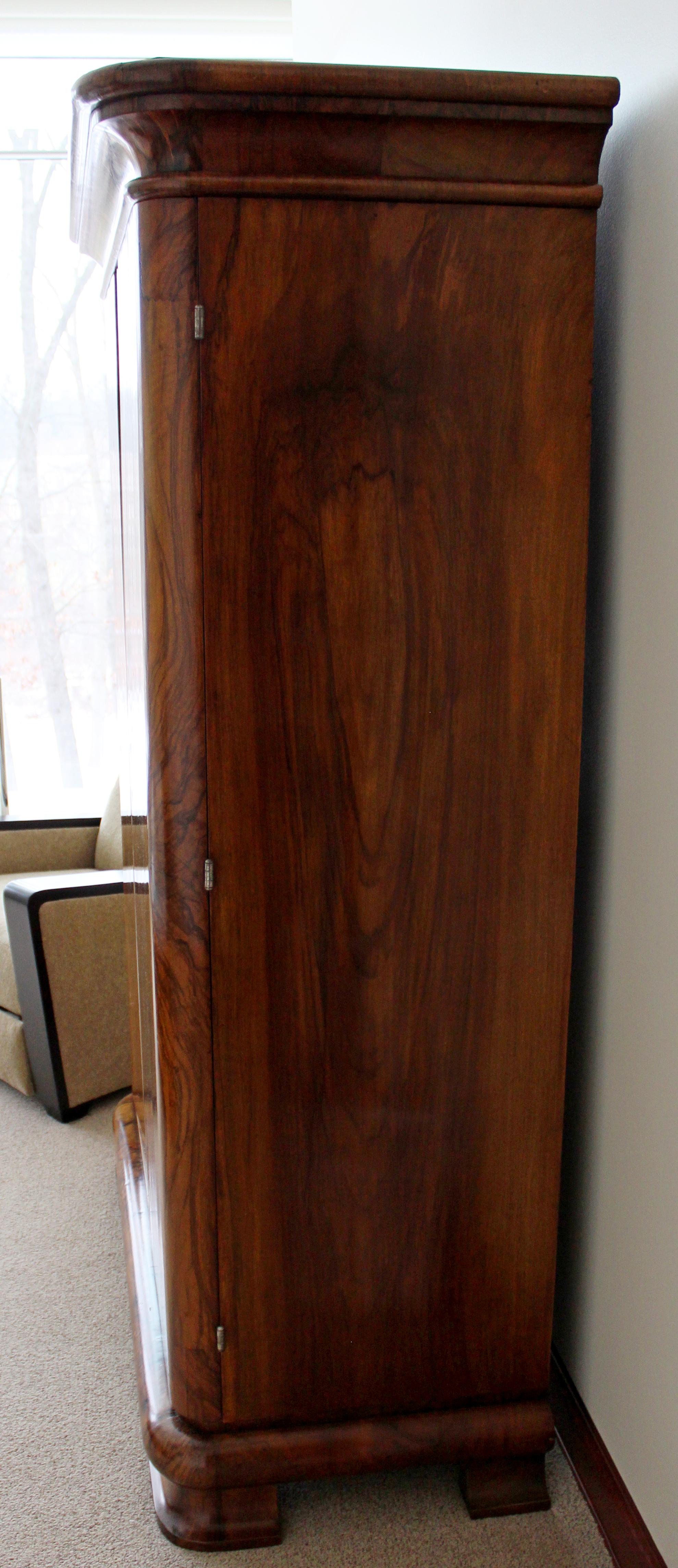 curved top armoire