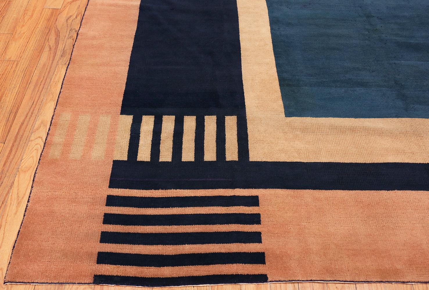 A beautifully impressive blue antique Indian Art Deco rug, Country of origin / Rug type: Antique Indian rugs, circa 1920. Size: 8 ft 8 in x 11 ft 8 in (2.64 m x 3.56 m)

The Art Deco design of this predominantly blue rug reflects the modern design
