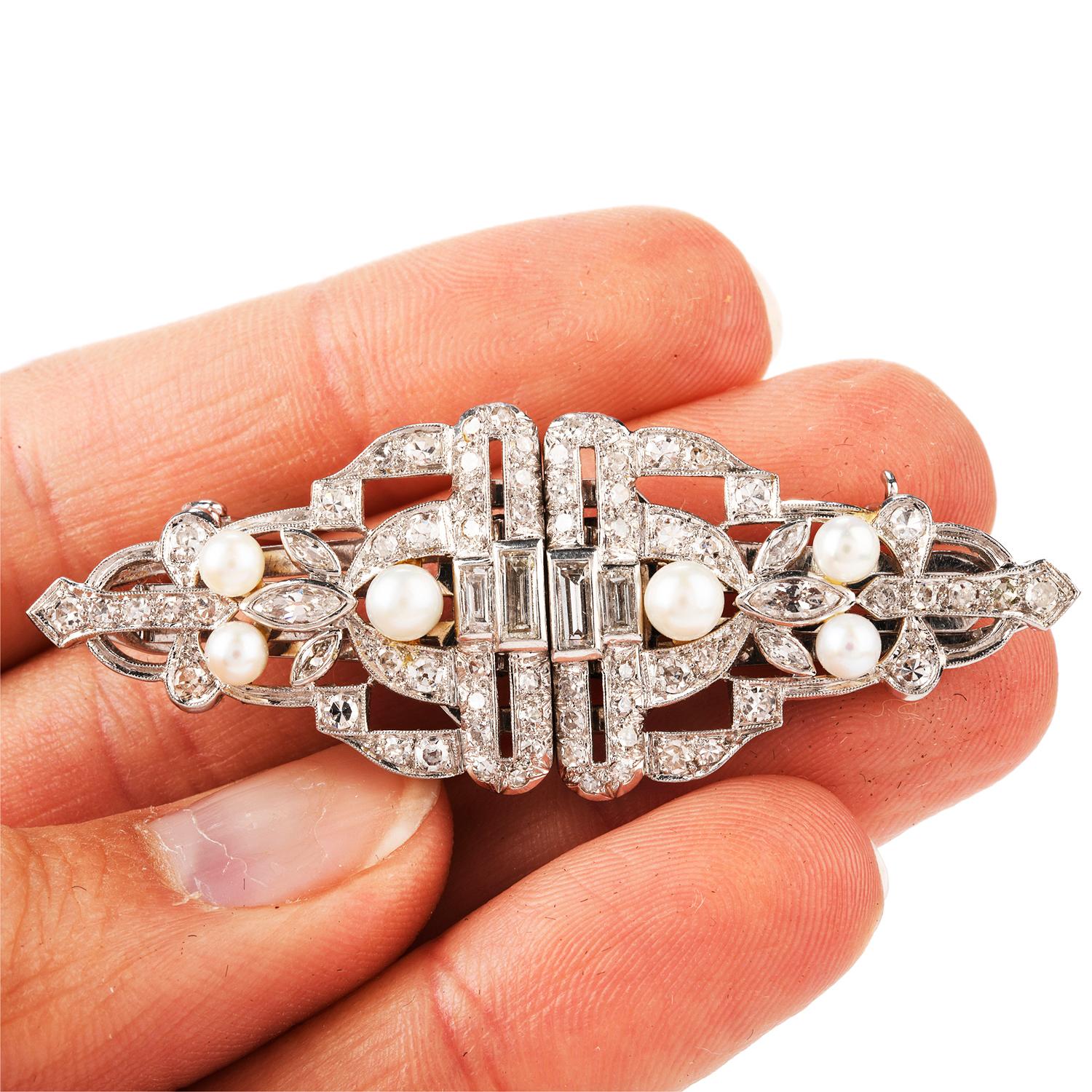 This stately art deco Emerald Cut Diamond Centered Brooch offers a feel of Royalty as the 2 crowns join in the center.

Prominently featured are an Emerald cut weighing approx. 1.48 carats G-H Vs1-VS2 clarity. and 4 large Baguette cut Diamonds