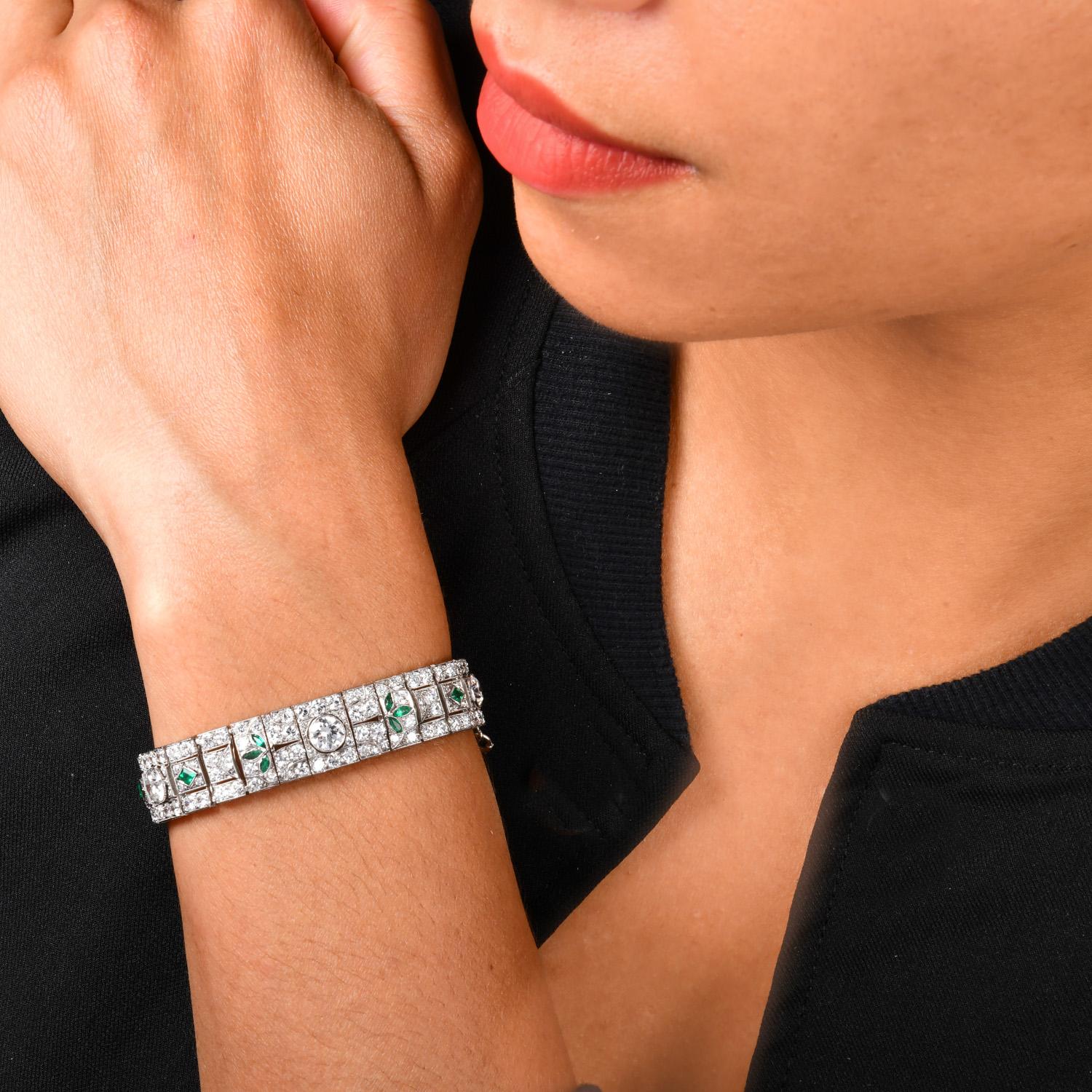 Experience the roaring 1920s again with this Vintage Art Deco Diamond & Emerald Platinum Bracelet!  The 18 Mixed Shape (marquies and diamond shape Colombian Emeralds stand out on center stage, supported by natural Round-cut diamonds.  All the