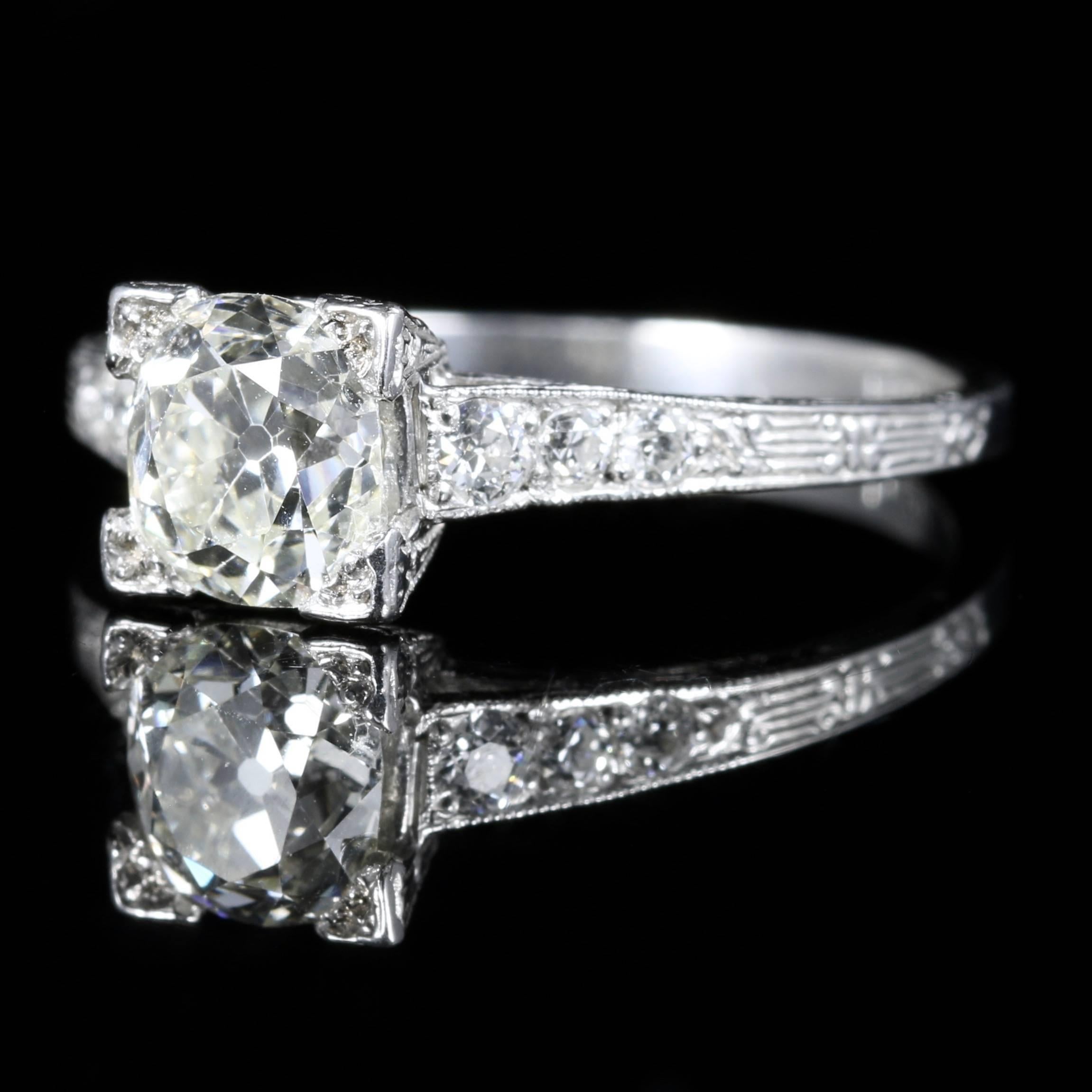 For more details please click continue reading down below...

This fabulous all original Art Deco 18ct White Gold ring is set with a lovely old cut bright white Diamond.

Smaller Diamonds are set into the shoulders of this ring, followed by