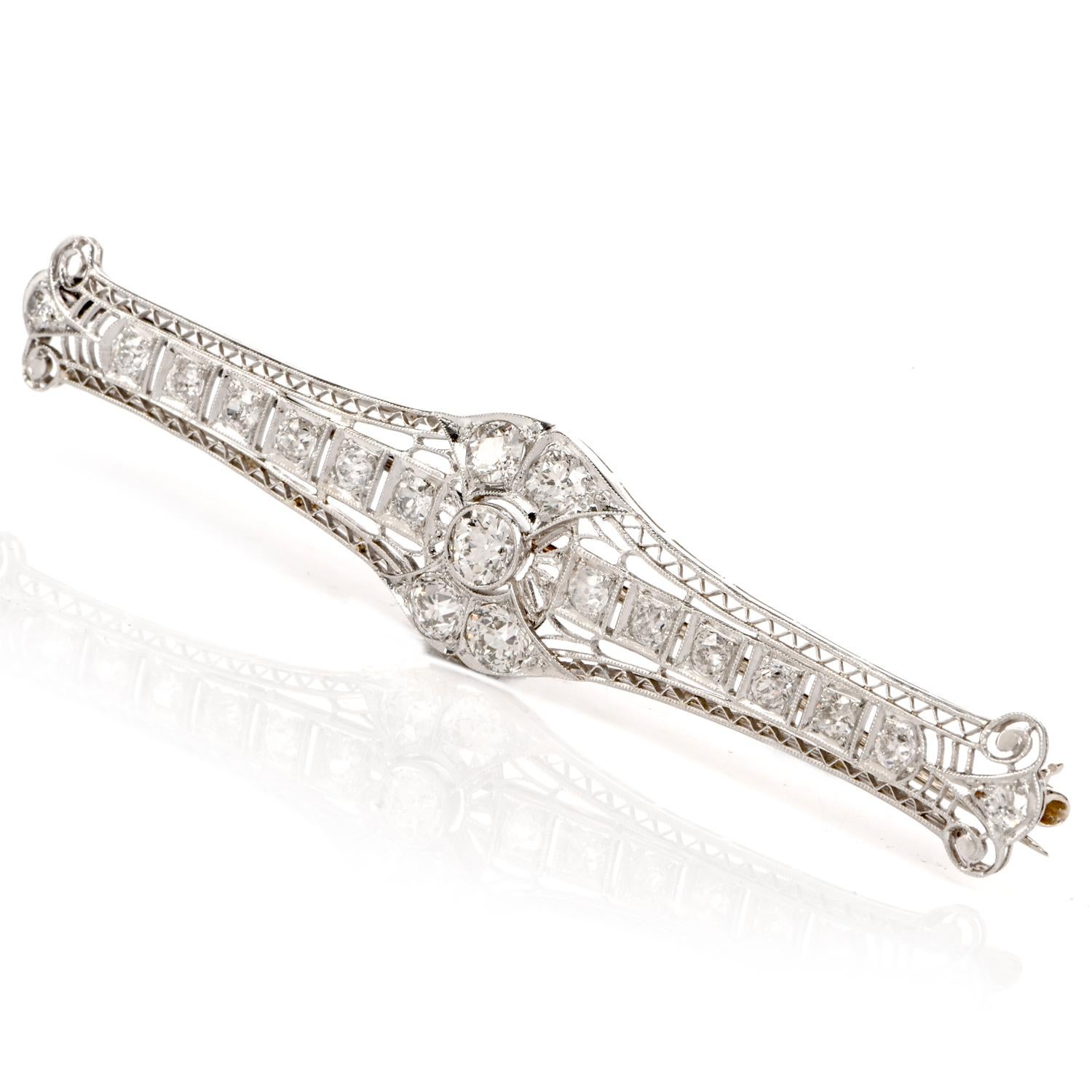 This captivating early Art deco bar pin brooch is handcrafted in platinum, weighing 9.4 grams and measuring 3 inches long and 15 mm wide. Composed of Art Deco geometric features, this stunning pin brooch is adorned with five large European round