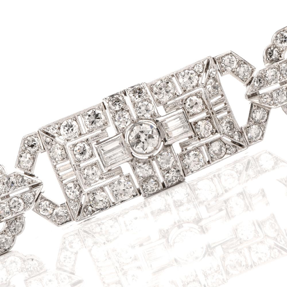 This exquisite diamond bracelet is expertly crafted in solid platinum, weighing 44.3 grams and measuring 6 3/4” around the wrist x 15mm wide. Displaying of a stunning geometric open-work Art Deco pattern studded in an array of diamonds. Composed of