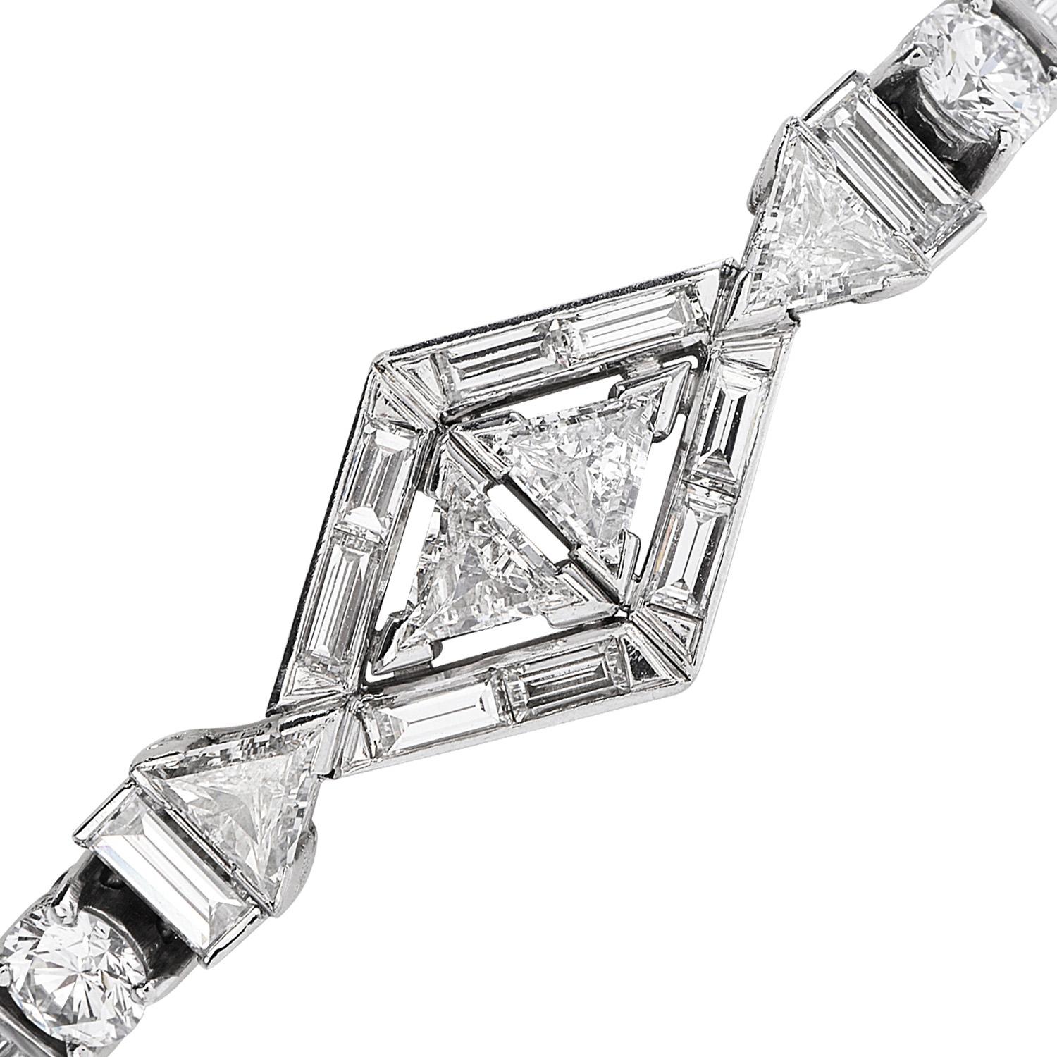 Antique Art Deco Style piece 1920s to 1930s, with breathtaking high-quality diamonds, 

Crafted in solid Platinum, its center composed of1 Genuine Diamonds, (4) Triangle cut, (13) Round-cut &  (34) Baguette-cut, prong-set & Half Bezel, 

weighing