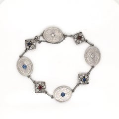 Antique Art Deco Diamond Sapphire and Ruby Charm Bracelet