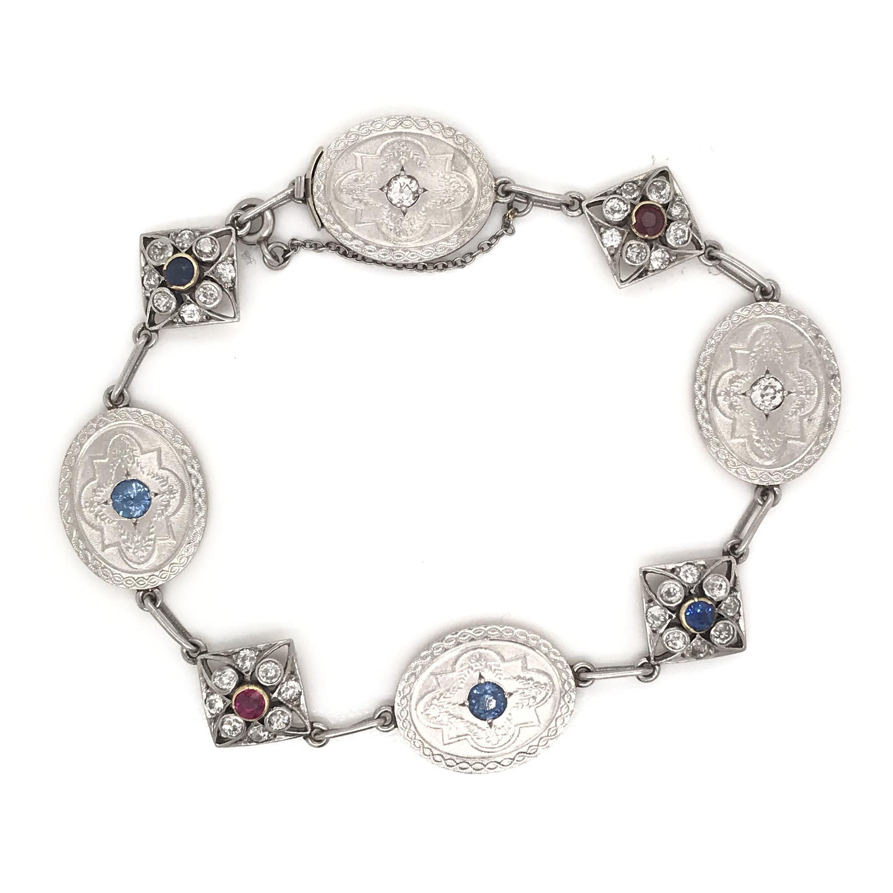 Round Cut Antique Art Deco Diamond Sapphire and Ruby Charm Bracelet