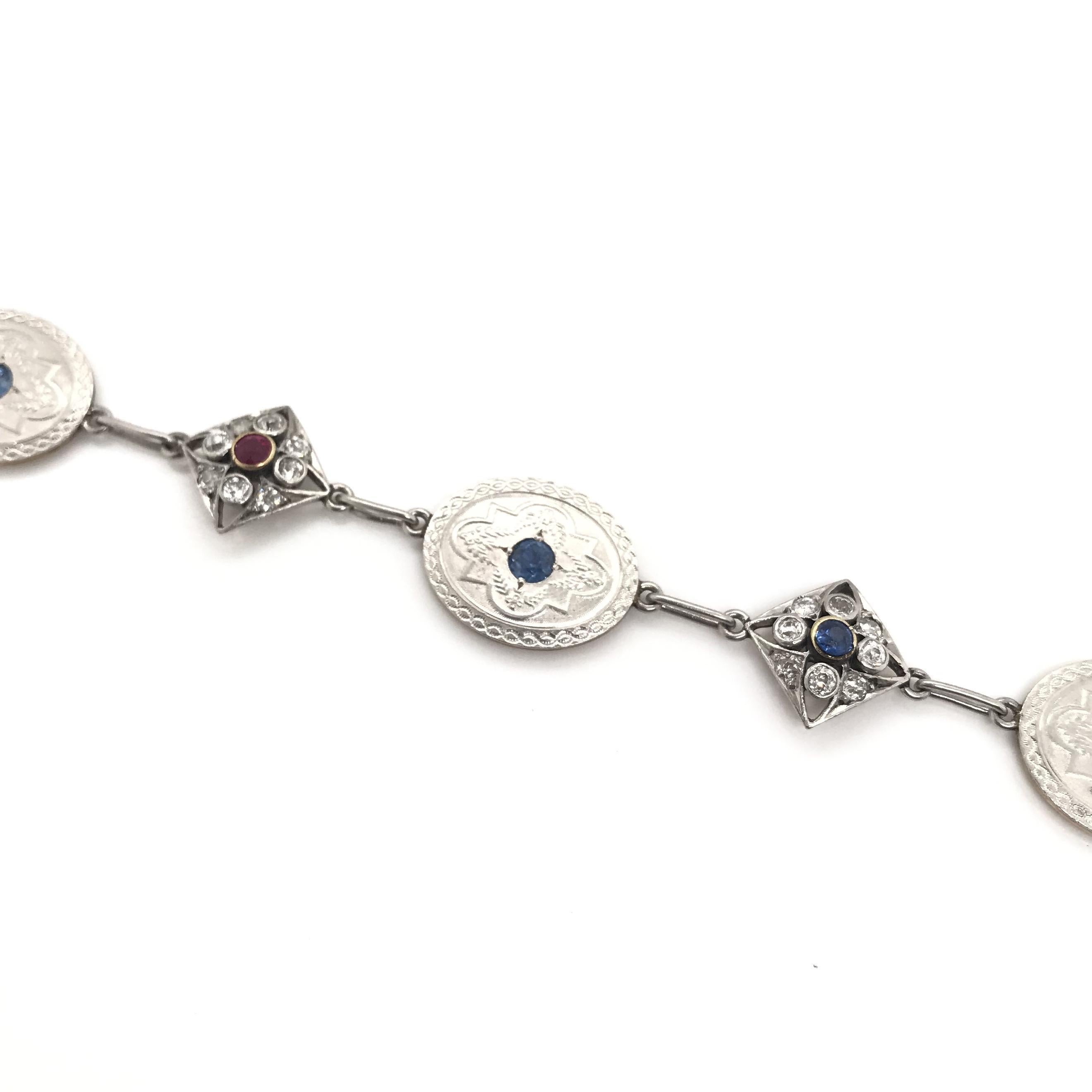 Antique Art Deco Diamond Sapphire and Ruby Charm Bracelet For Sale 1