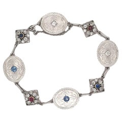 Antique Art Deco Diamond Sapphire and Ruby Charm Bracelet