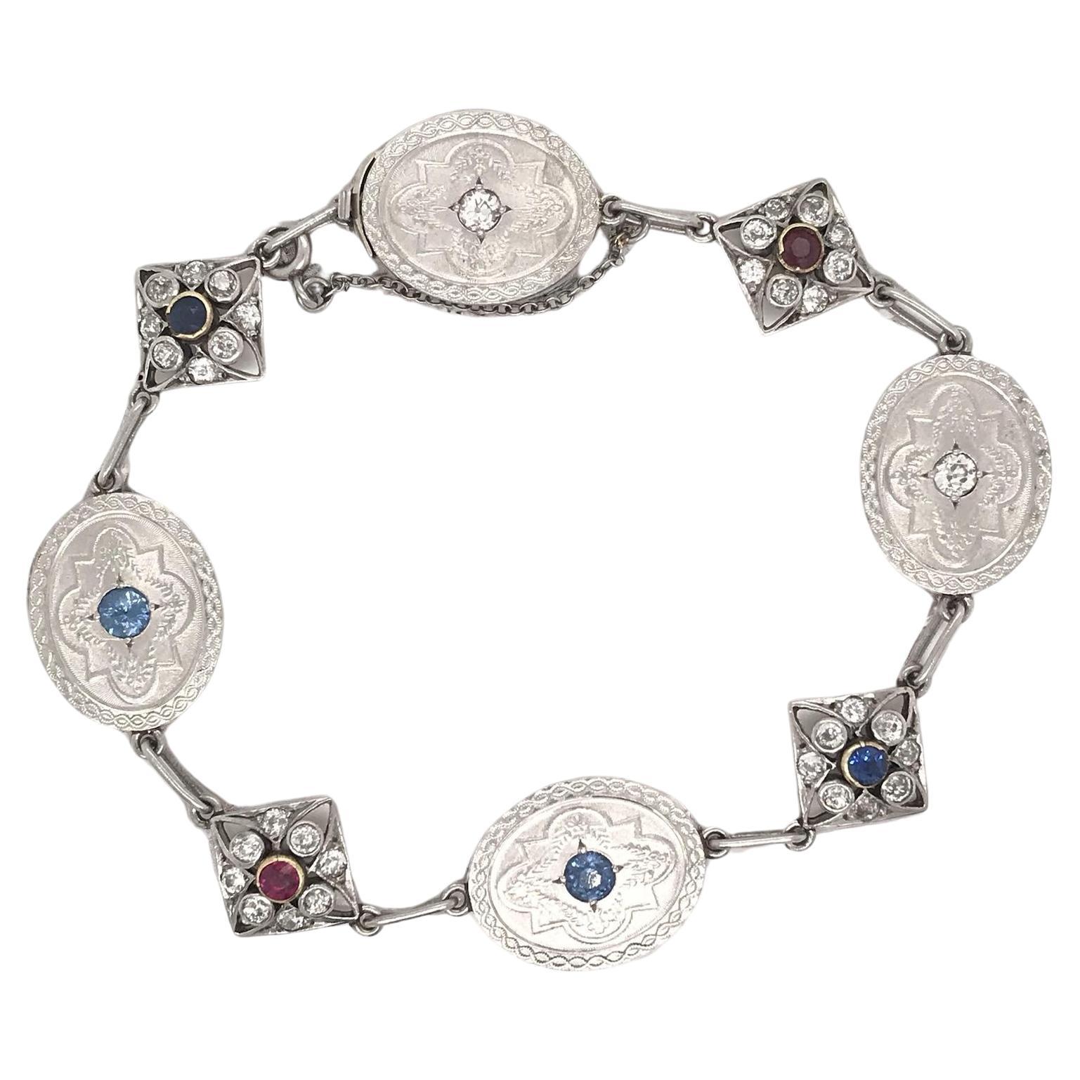 Antique Art Deco Diamond Sapphire and Ruby Charm Bracelet For Sale
