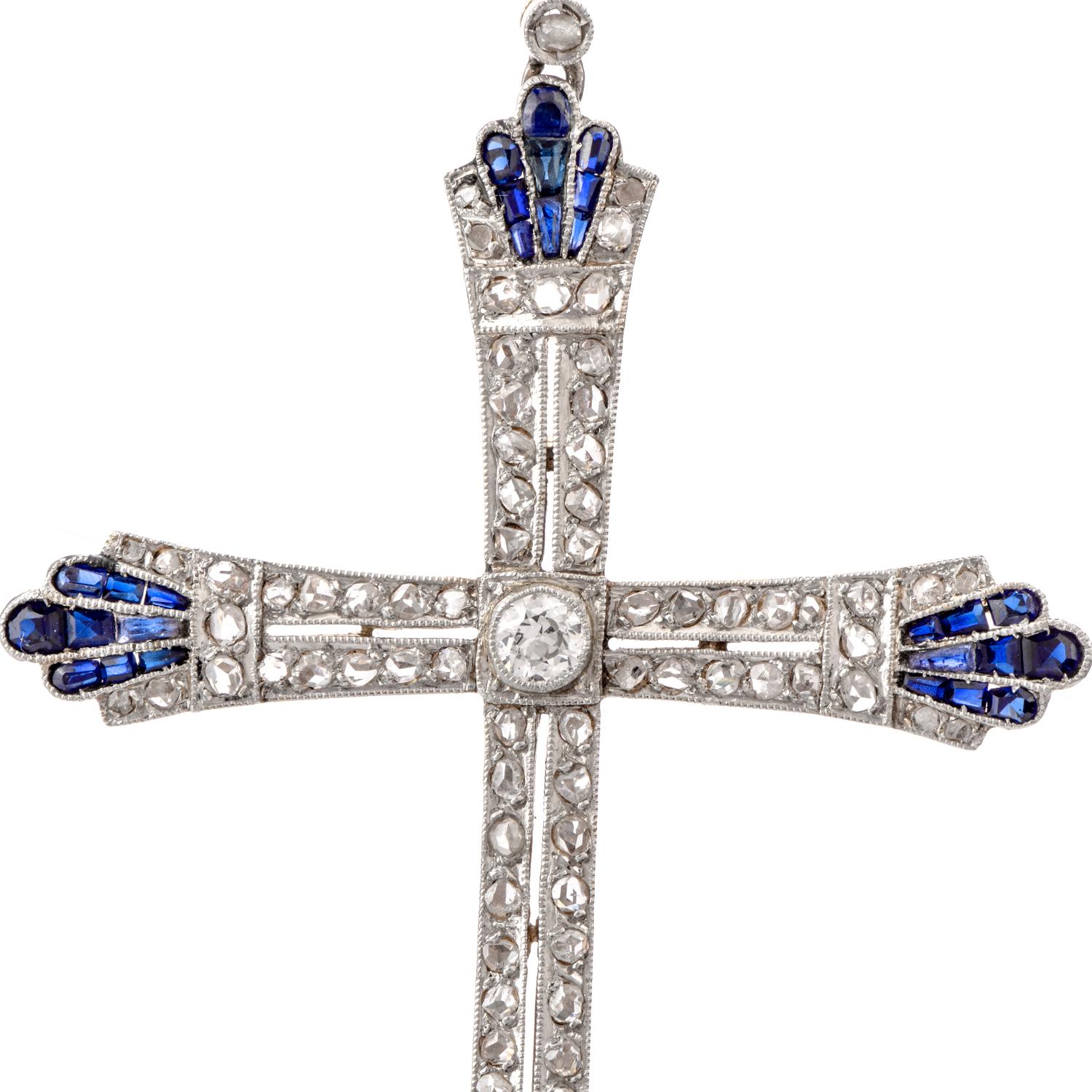 This antique pendant was inspired in an Art Deco styled Cross motif and

crafted in Platinum and 18K gold.

European cut and rose cut daimonds are featured through the center

of the cross weighing cumulatively appx. 1.08 carats and are

of G-H