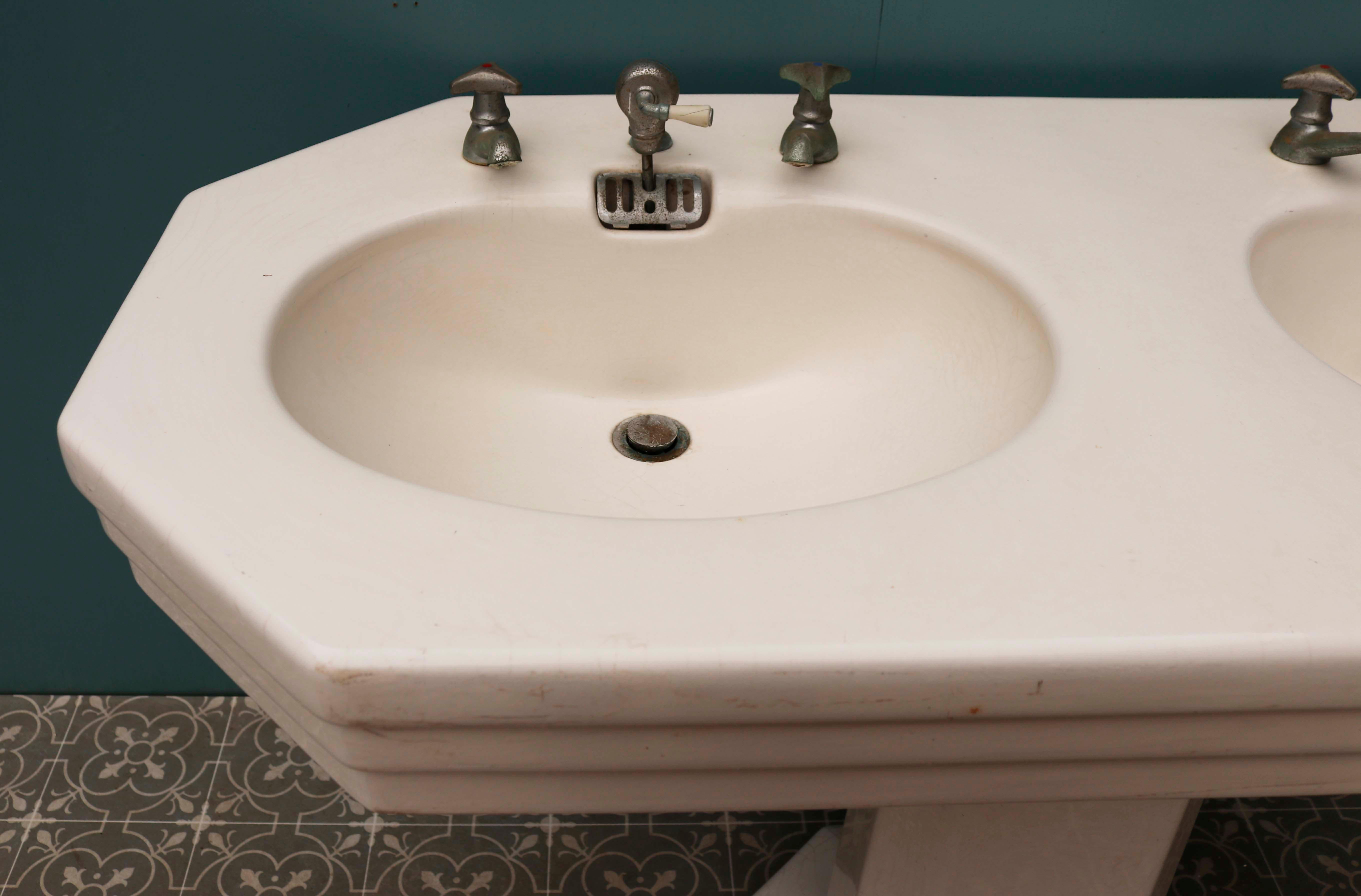 Antique Art Deco double sink. This original, French double basin has been produced in the style of Art Deco in the early 20th century. It displays a wonderful octagon inspired shape around the edges of the basin in true Art Deco style. The sink is