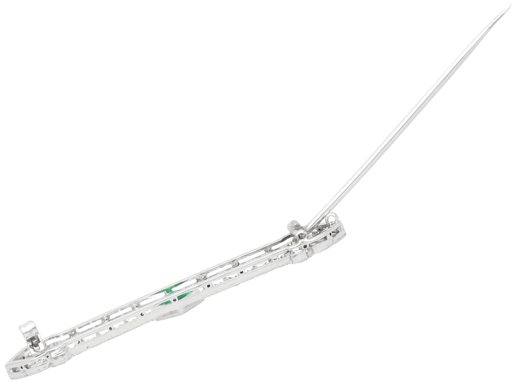 Antique Art Deco Emerald and 1.29 Carat Diamond Platinum Brooch For Sale 1