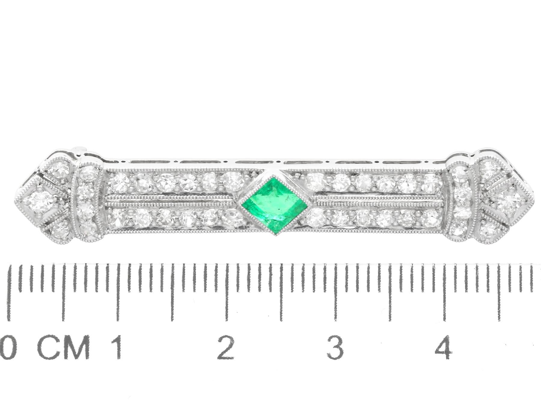 Antique Art Deco Emerald and 1.29 Carat Diamond Platinum Brooch For Sale 2