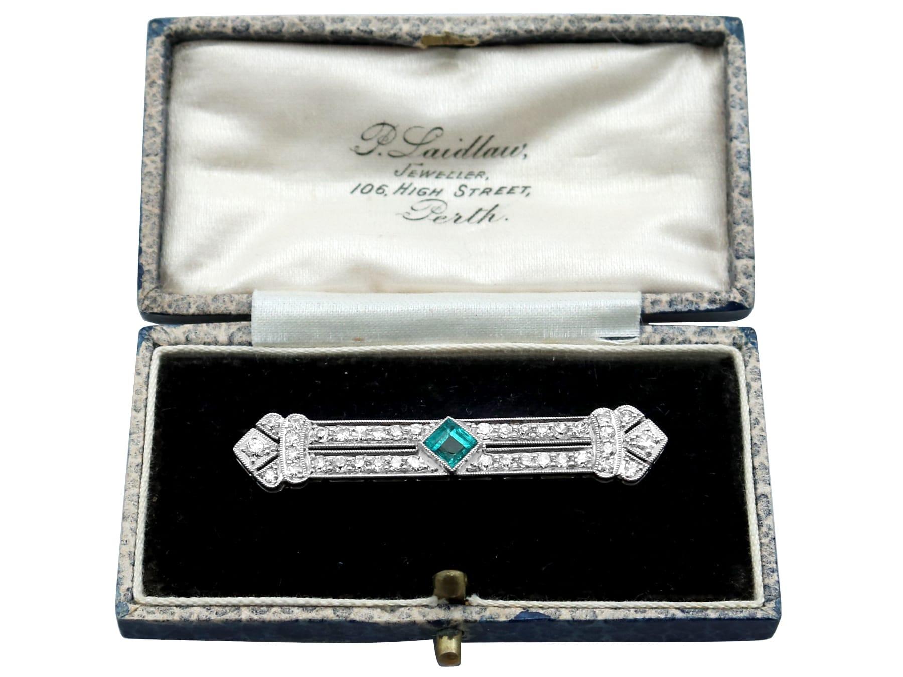 Antique Art Deco Emerald and 1.29 Carat Diamond Platinum Brooch For Sale 3