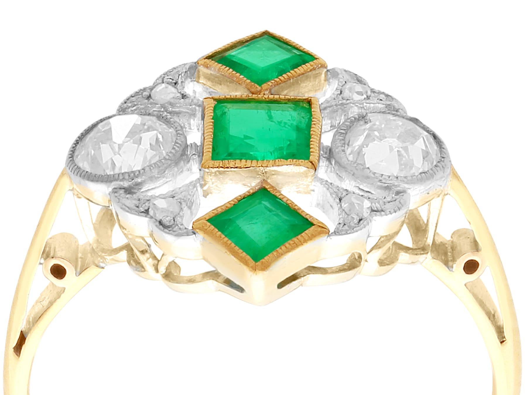 A stunning, fine and impressive antique 0.55 carat emerald and 0.54 carat diamond, 18 karat yellow gold and palladium set dress ring; part of our diverse antique jewelry collections.

This stunning, fine and impressive antique 1920s emerald ring has