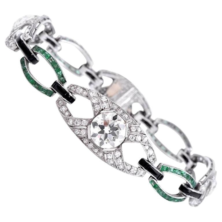 Antikes, offenes Art-Déco-Gliederarmband aus Platin mit Smaragd und Diamant im Angebot