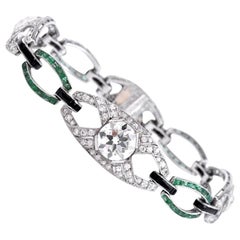Bracelet Art déco ancien à maillons ouverts en platine, avec émeraudes et diamants