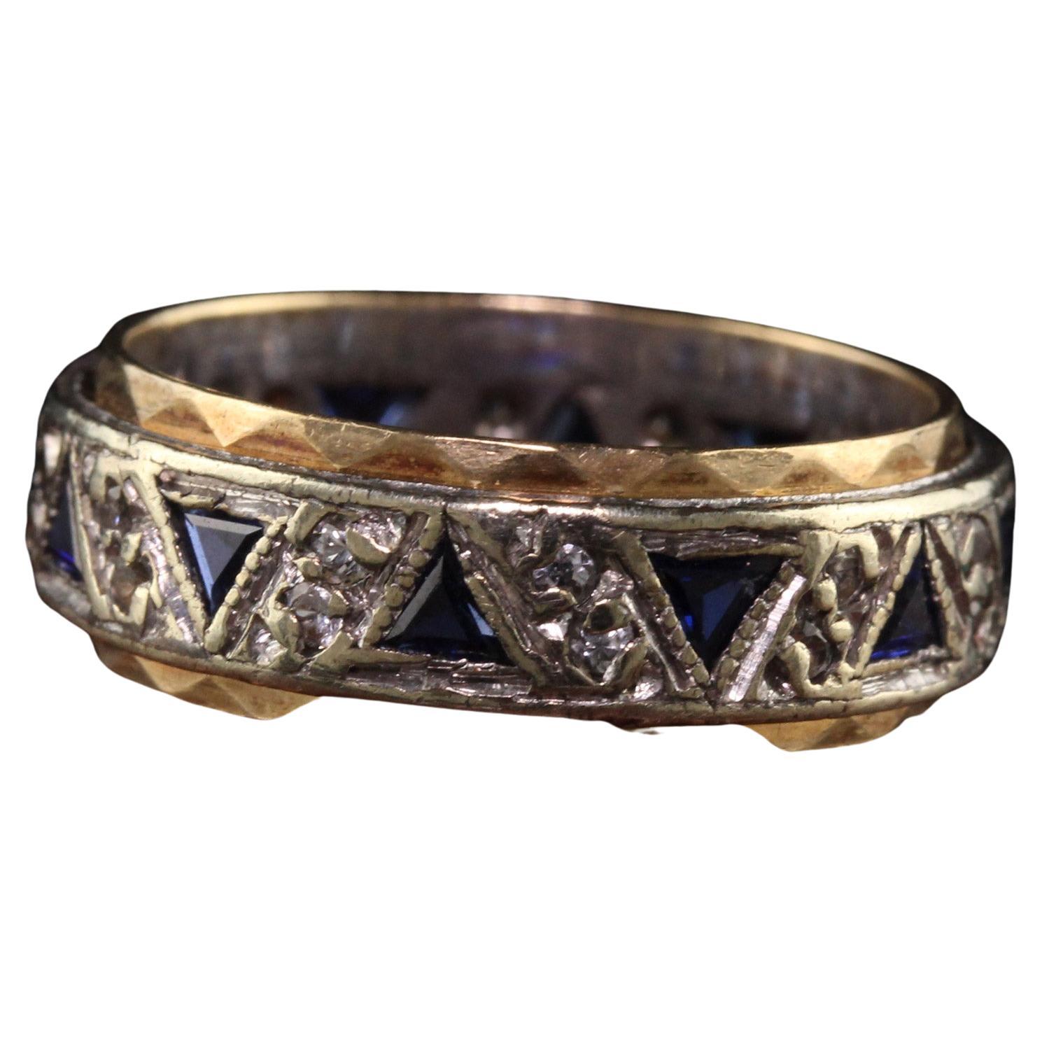 Beautiful Antique Art Deco English 9K Yellow and White Gold Sapphire Diamond Band. This incredible band is crafted in 9k white and yellow gold. The band has triangle cut sapphires and single cut diamonds set all around the entire band. The inside is