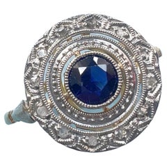 Bague ancienne de l'époque Art déco en or 18 carats avec diamants et saphir bleu