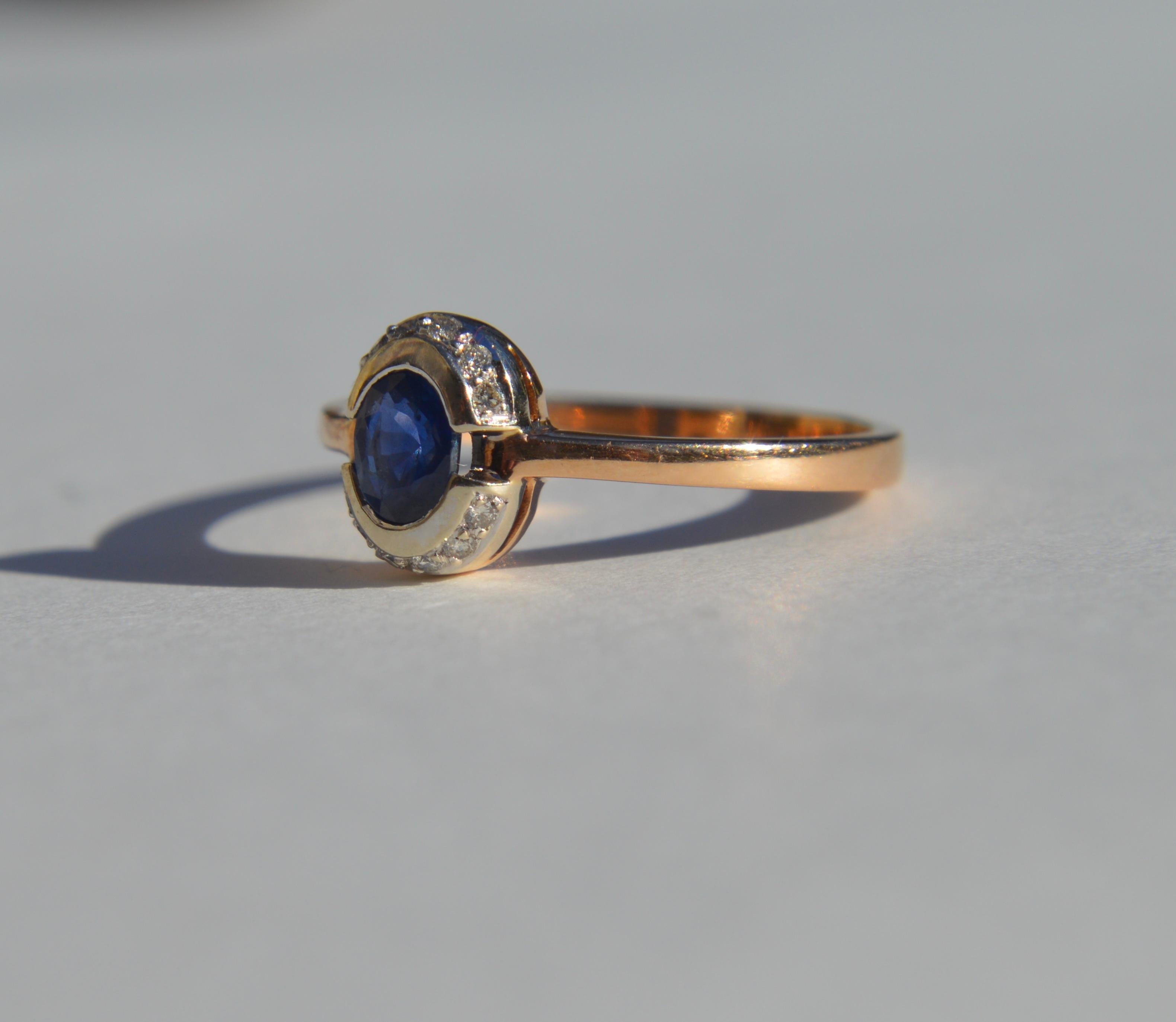 Gorgeous antique Art Deco era 1920s .35 carat natural unheated sapphire ring in 14K rose gold with a diamond halo consisting of 12 diamonds. Each clean, white, sparkling single cut diamond measures 1mm (.005 carat). The natural sapphire is a lovely