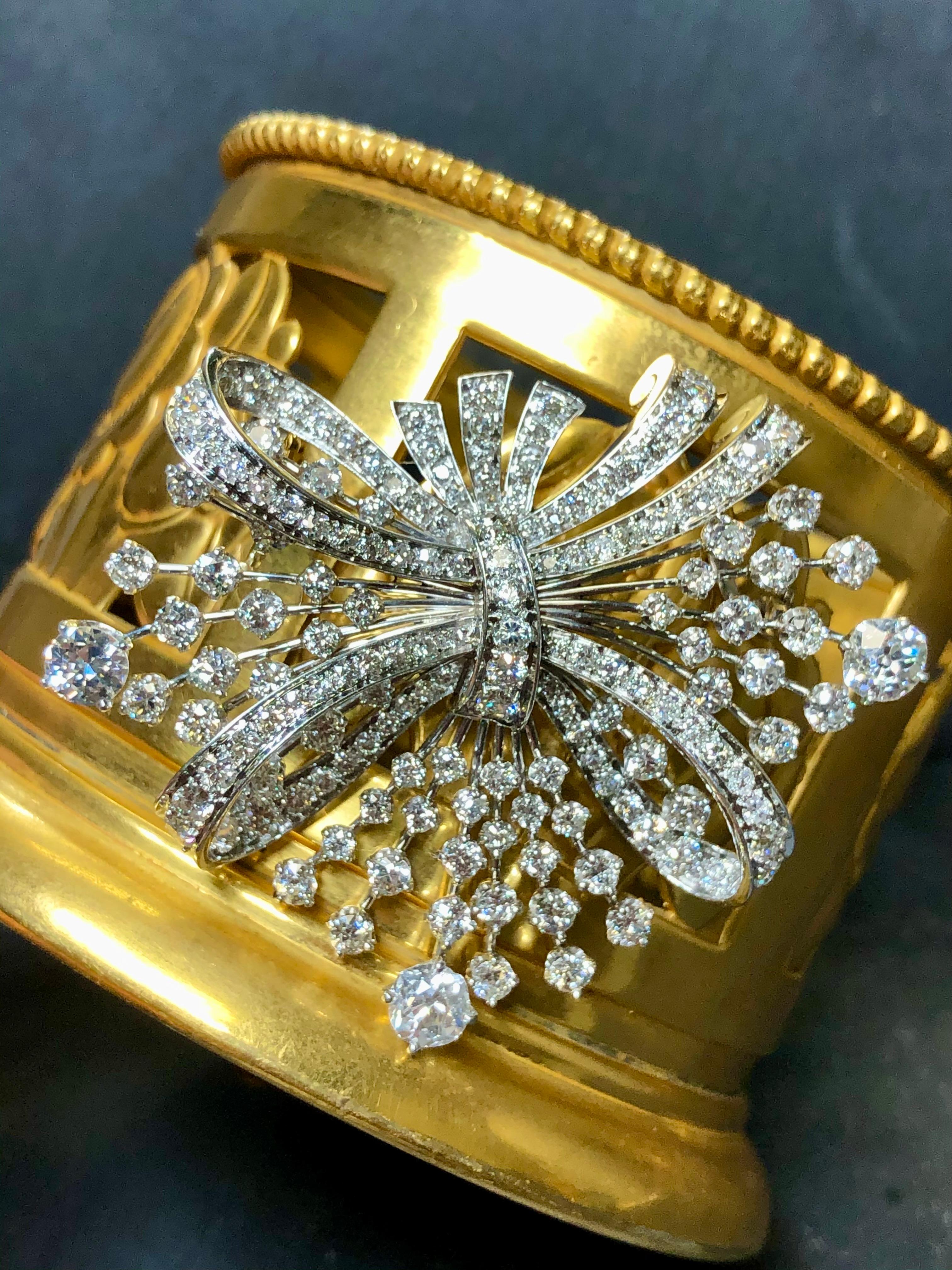 An incredibly well-made and original Art Deco period brooch done in platinum and exquisitely set with approximately 7.10cttw in G-H color Vs1-Si2 clarity old European as well as mine cut diamonds with three of those stones, being approximately .60ct