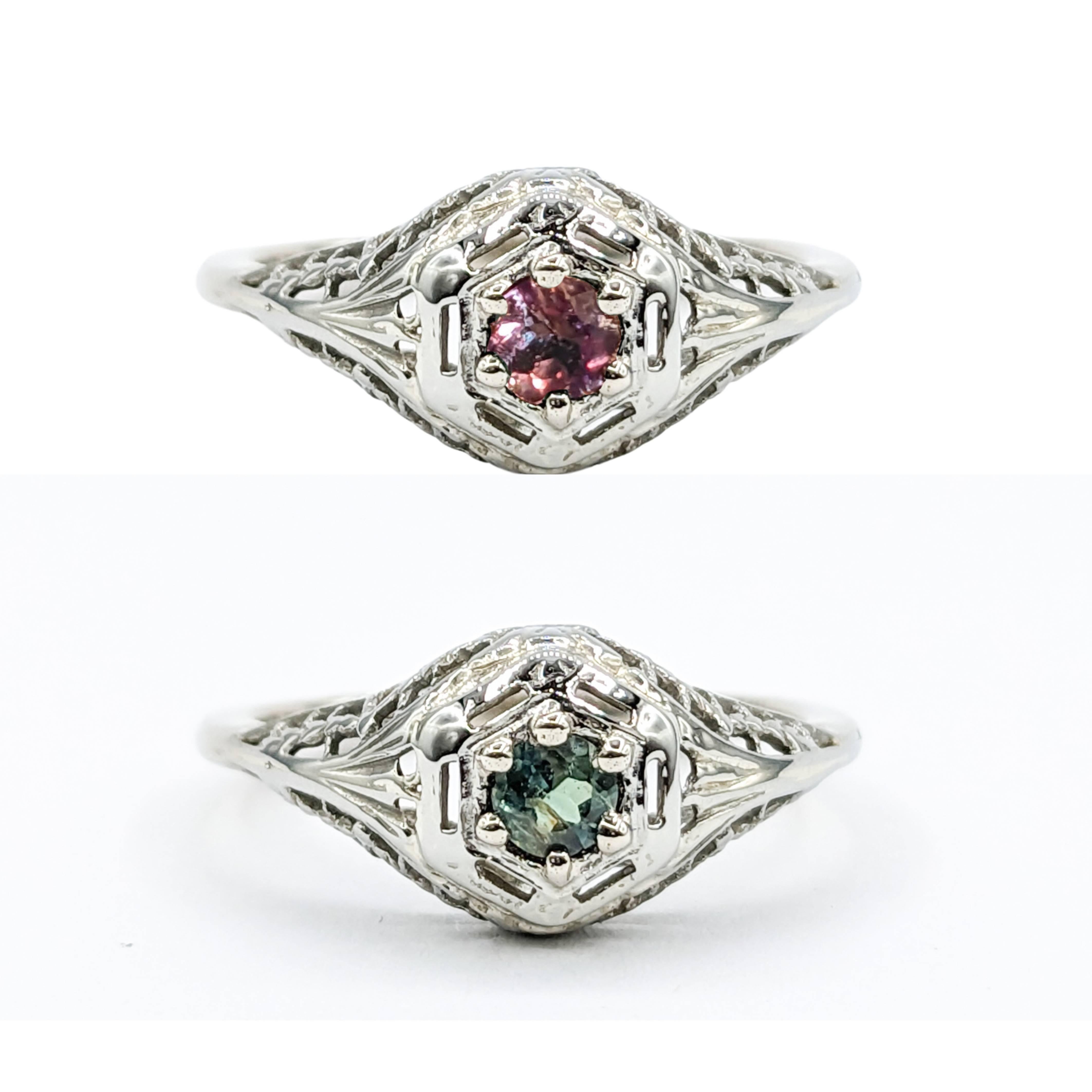 Antique Art Deco Filigree Alexandrite Ring in 18Kt White Gold Ring

Introducing this fantastic art deco ring set with a natural color change .30ctw Alexandrite. This beautiful antique ring features 18Kt White Gold filigree in a classic Antique
