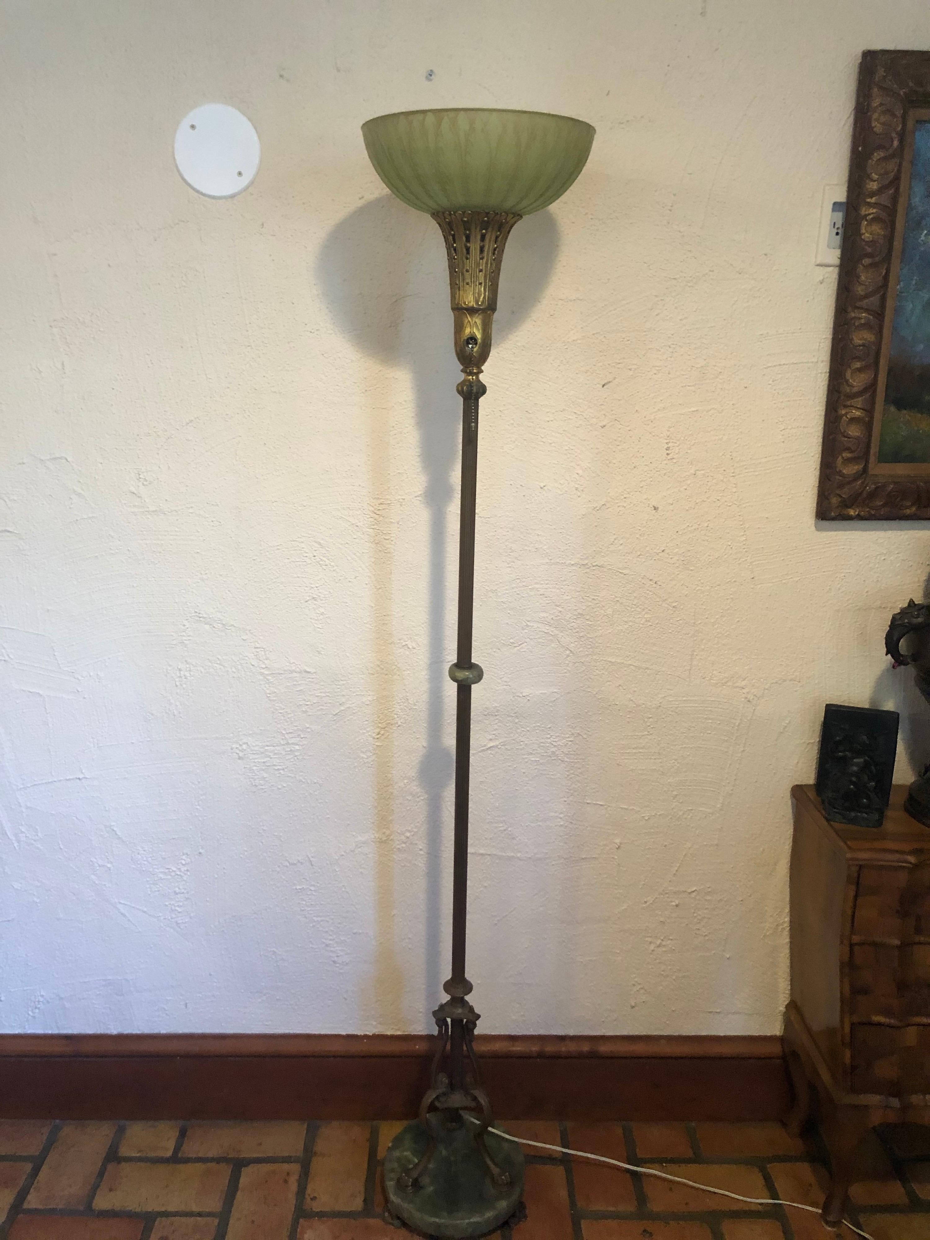 Antique Art Deco floor lamp. Intricate designed art glass open shade with elaborately detailed metal design. Green agate accent in the middle of the floor lamp trunk and impressive round green marble base with brass paw feet. Fully functioning pull