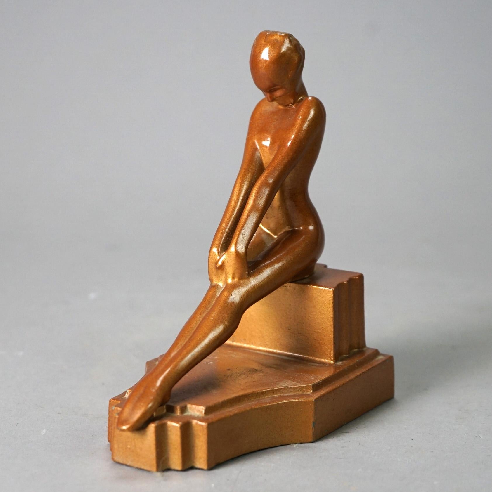 An antique Art Deco set of figural Frankart bookends offer cast metal construction with sculptural female nudes, c1930

Measure - 6.5