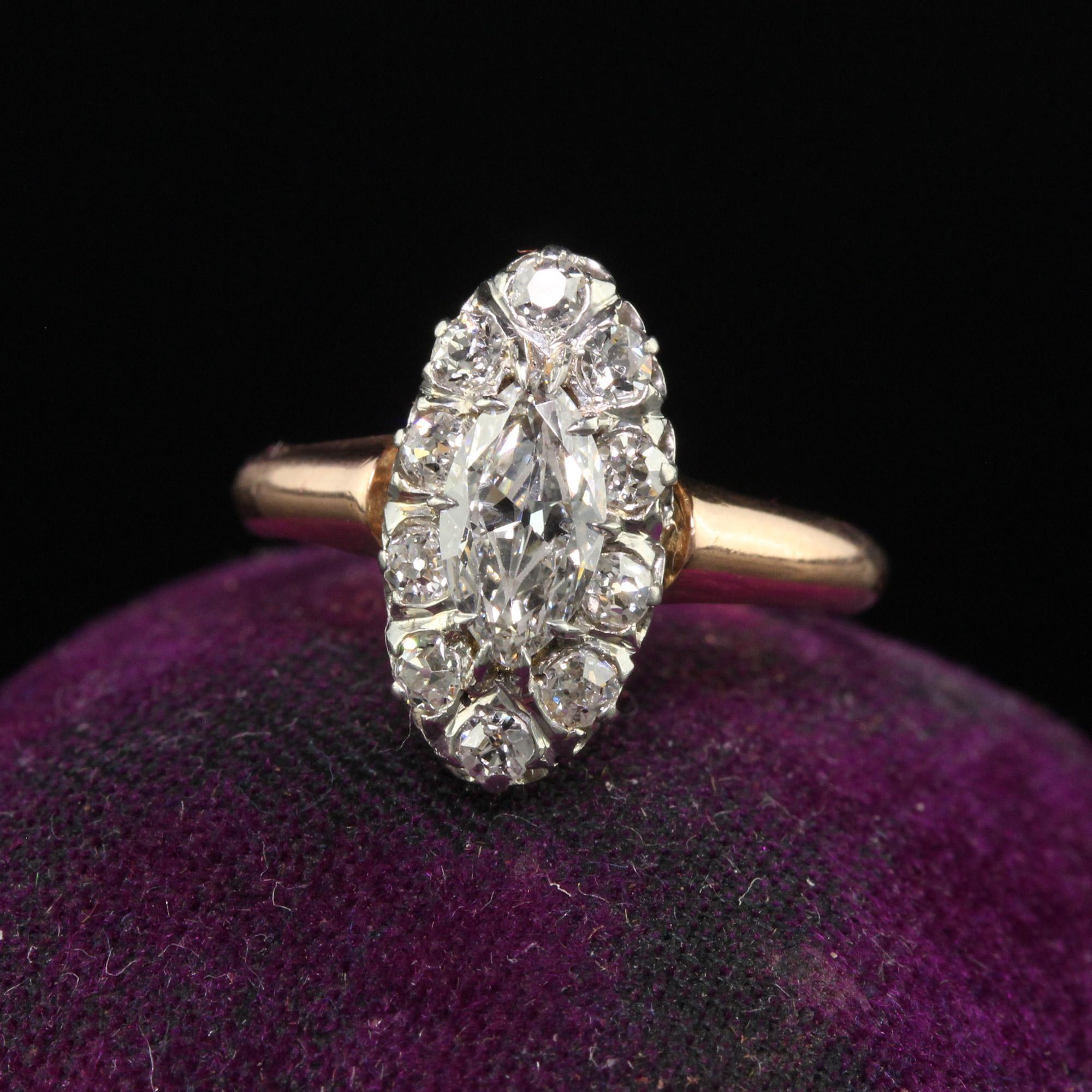 Beautiful Antique Edwardian French 18K Rose Gold Platinum Old Euro Marquise Engagement Ring. This gorgeous engagement ring is crafted in 18k rose gold and platinum top. The center holds an old cut marquise diamond that has a GIA report. The center