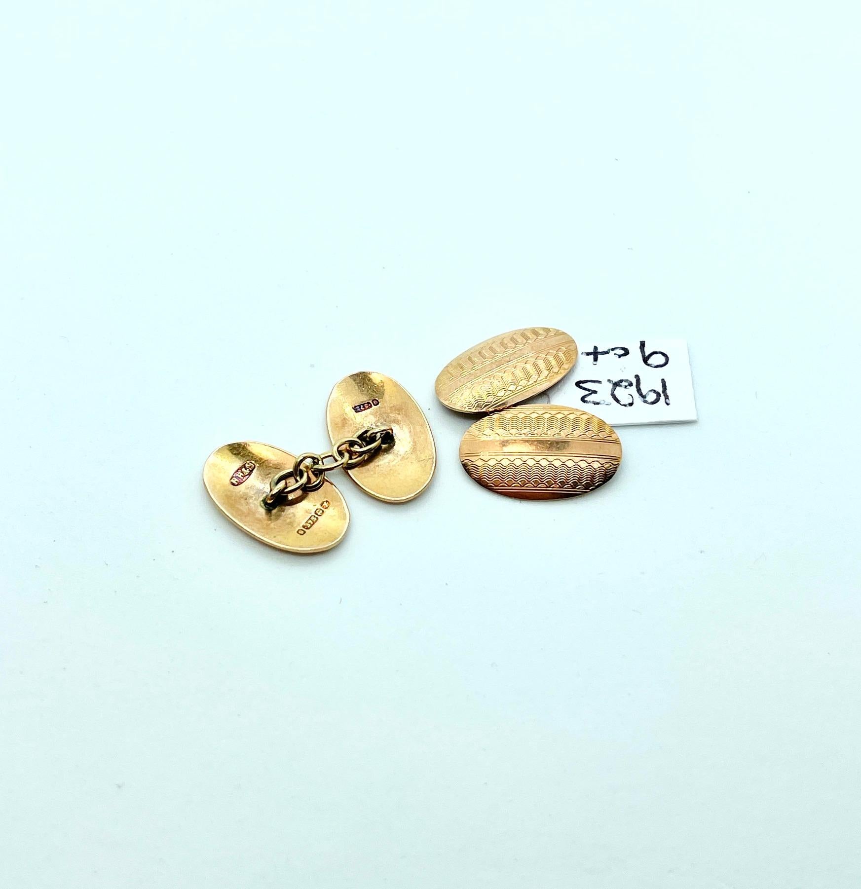 A fine pair of 9ct gold cufflinks , great Art Deco styling and hallmarks for Birmingham 1923 plus the makers mark H H & S, Henry Hobson and Sons. They are oval in shape with nice machine turned pattern and are connected with a gold link