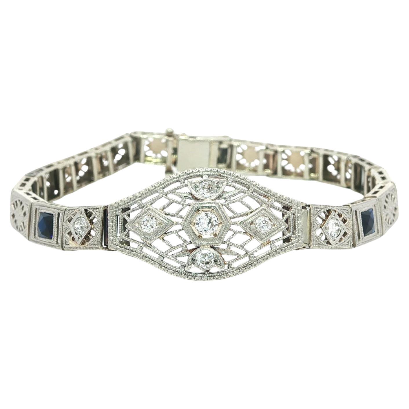 Bracelet antique Art Deco en or et platine, diamant taille ancienne et saphir en filigrane