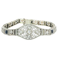 Bracelet antique Art Deco en or et platine, diamant taille ancienne et saphir en filigrane