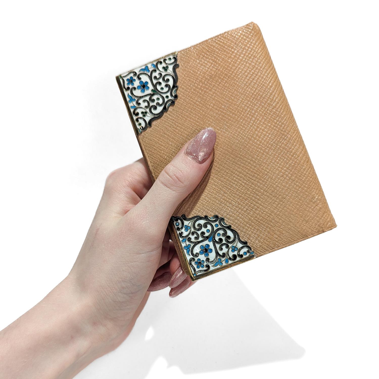 A fine antique Art Deco wallet or billfold.

By Gorham.

In enameled sterling silver, enamel, & leather.

Marked to the interior for Gorham.

Simply a wonderful Deco wallet!

Date:
Early 20th Century

Overall Condition:
It is in overall good,
