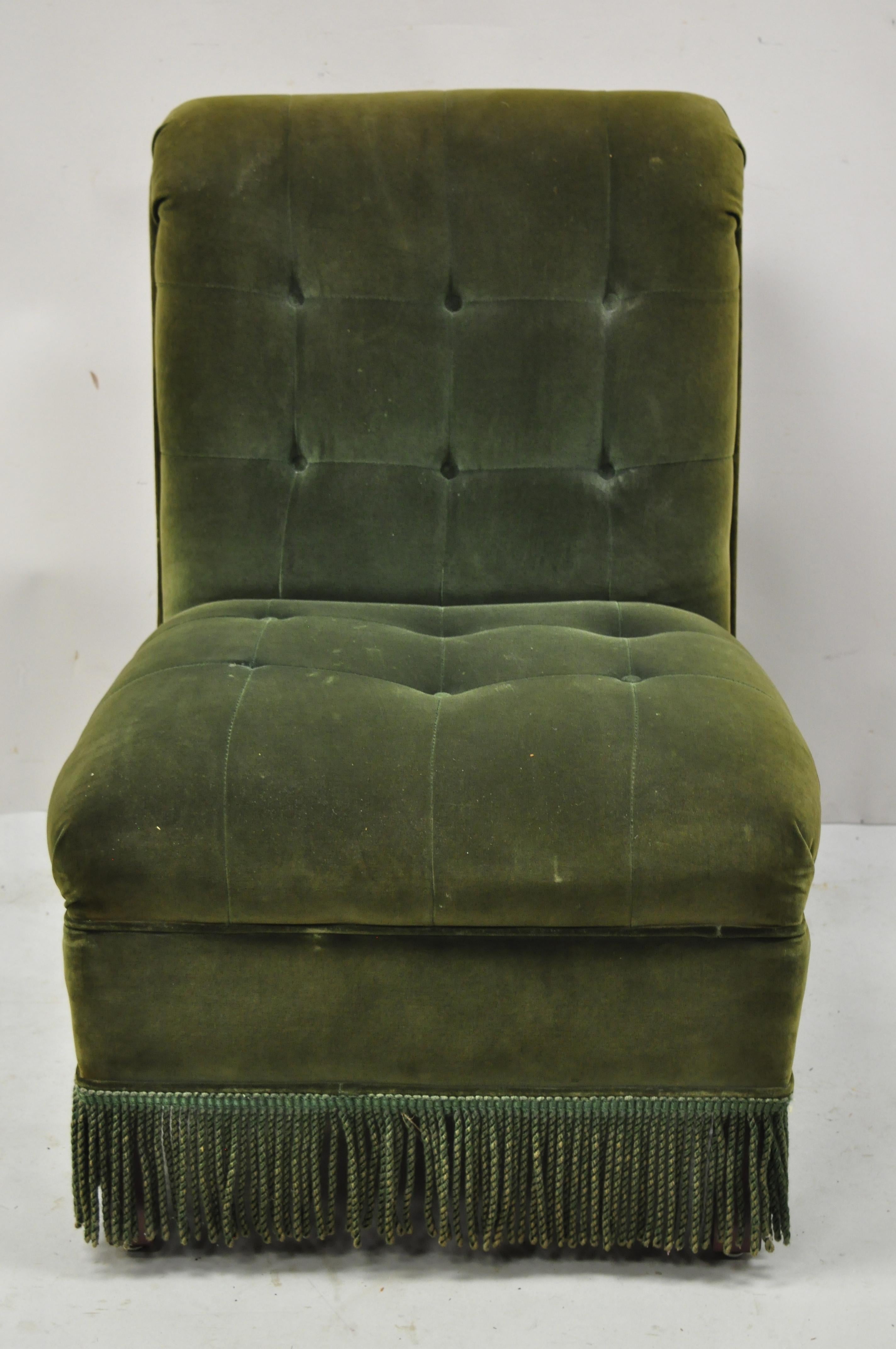 Antique Art Deco green mohair/velvet rolled back slipper lounge chair w/ fringed skirt. Item features tufted green original upholstery, fringed skirt, rolled back, solid wood legs, solid wood frame, very nice antique item, great style and form,
