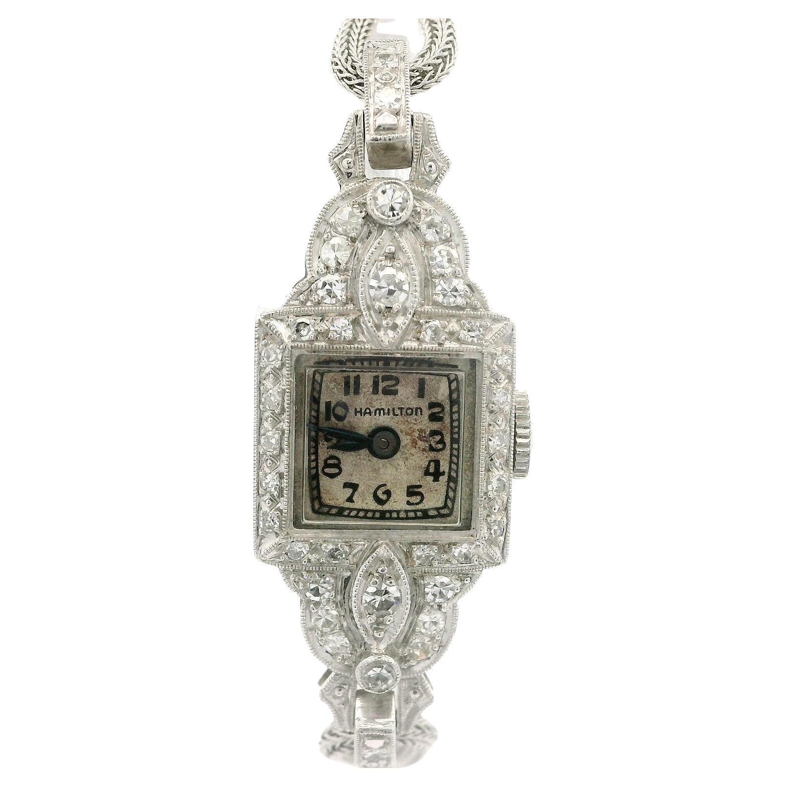 Hamilton, montre-bracelet jonc art déco ancien en or blanc et platine avec diamants