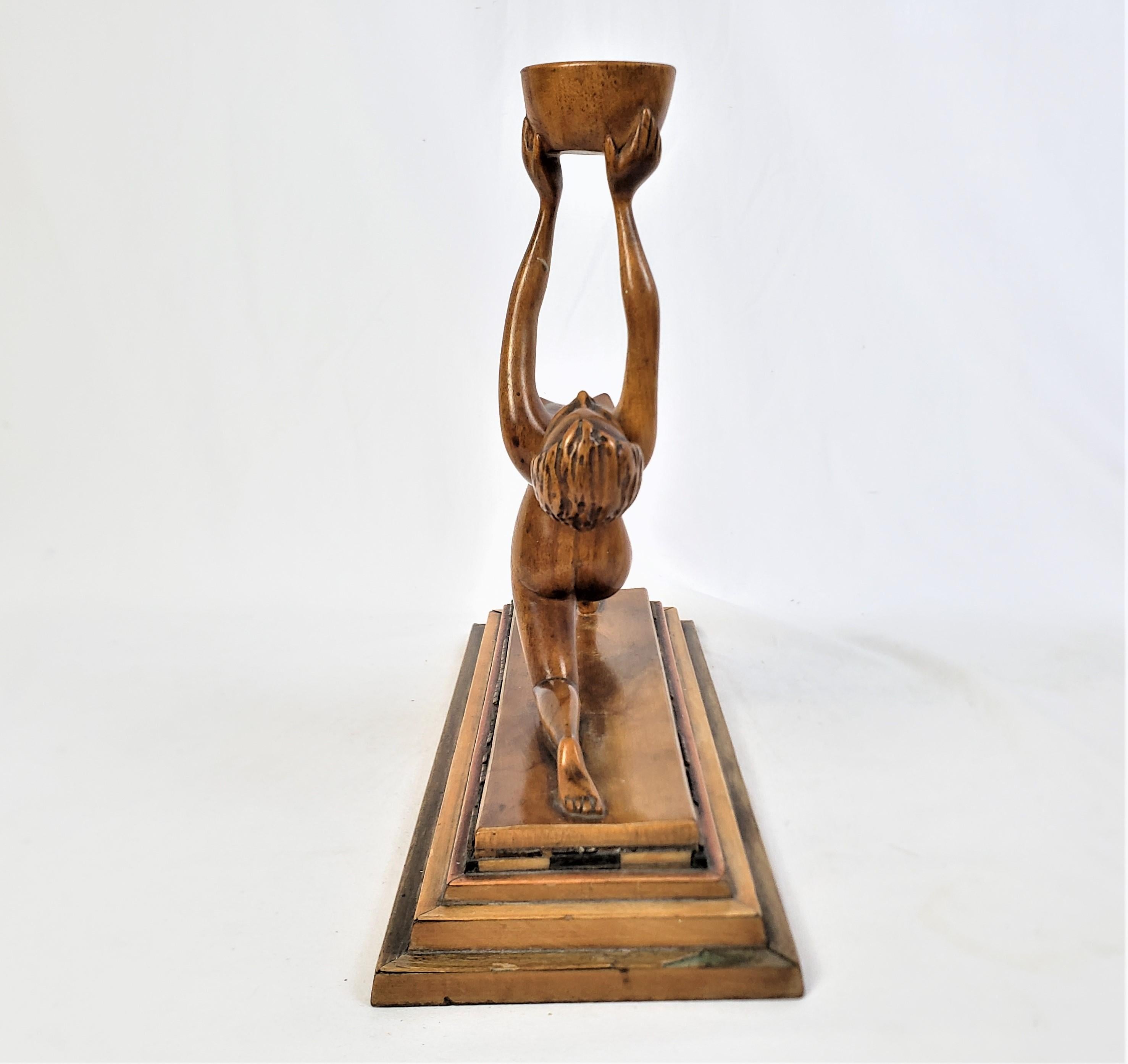 Antique Art Deco Hand-Carved Wooden Sculpture of a Nude Female Holding a Basket In Good Condition For Sale In Hamilton, Ontario