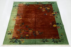 Alfombra china antigua Art Decó floral hecha a mano de lana verde y marrón