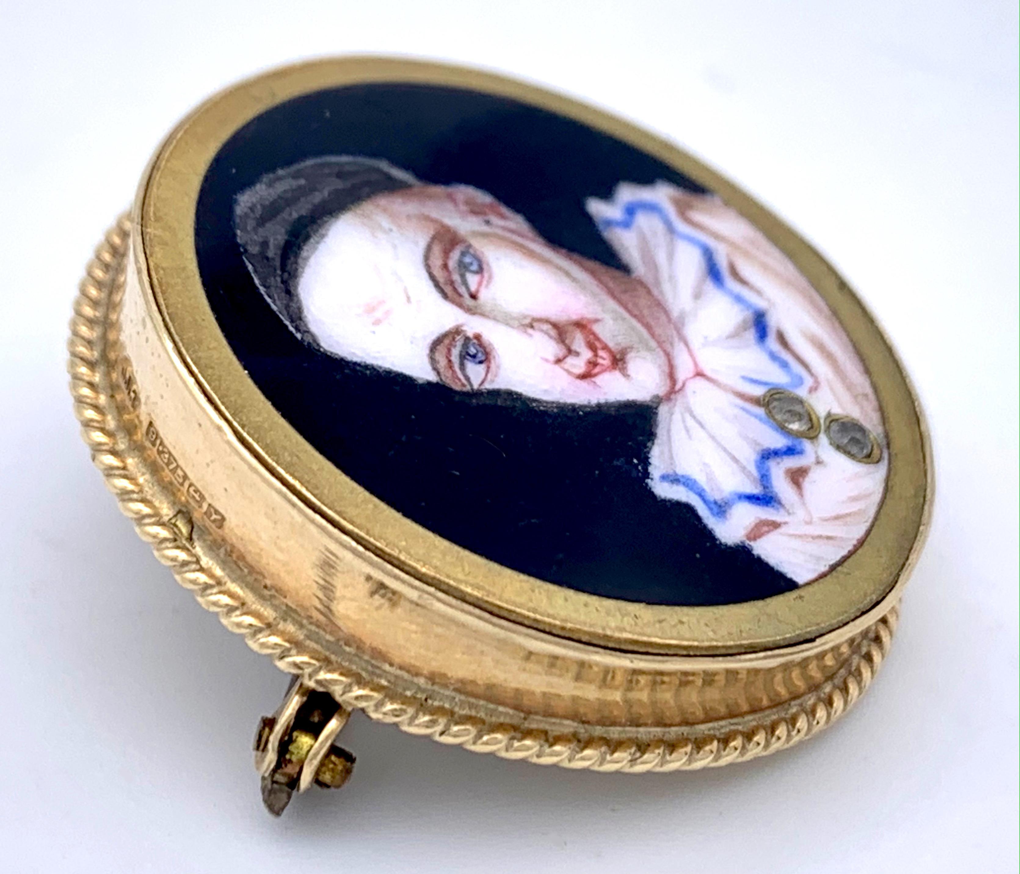 This charming and unusual Pierrot brooch ist made out of 9 karat gold and has been hand painted with polychrome enamel.
The buttons of the Pierrot's costume are set with rose cut diamonds.  This much loved brooch has some light scraches to the