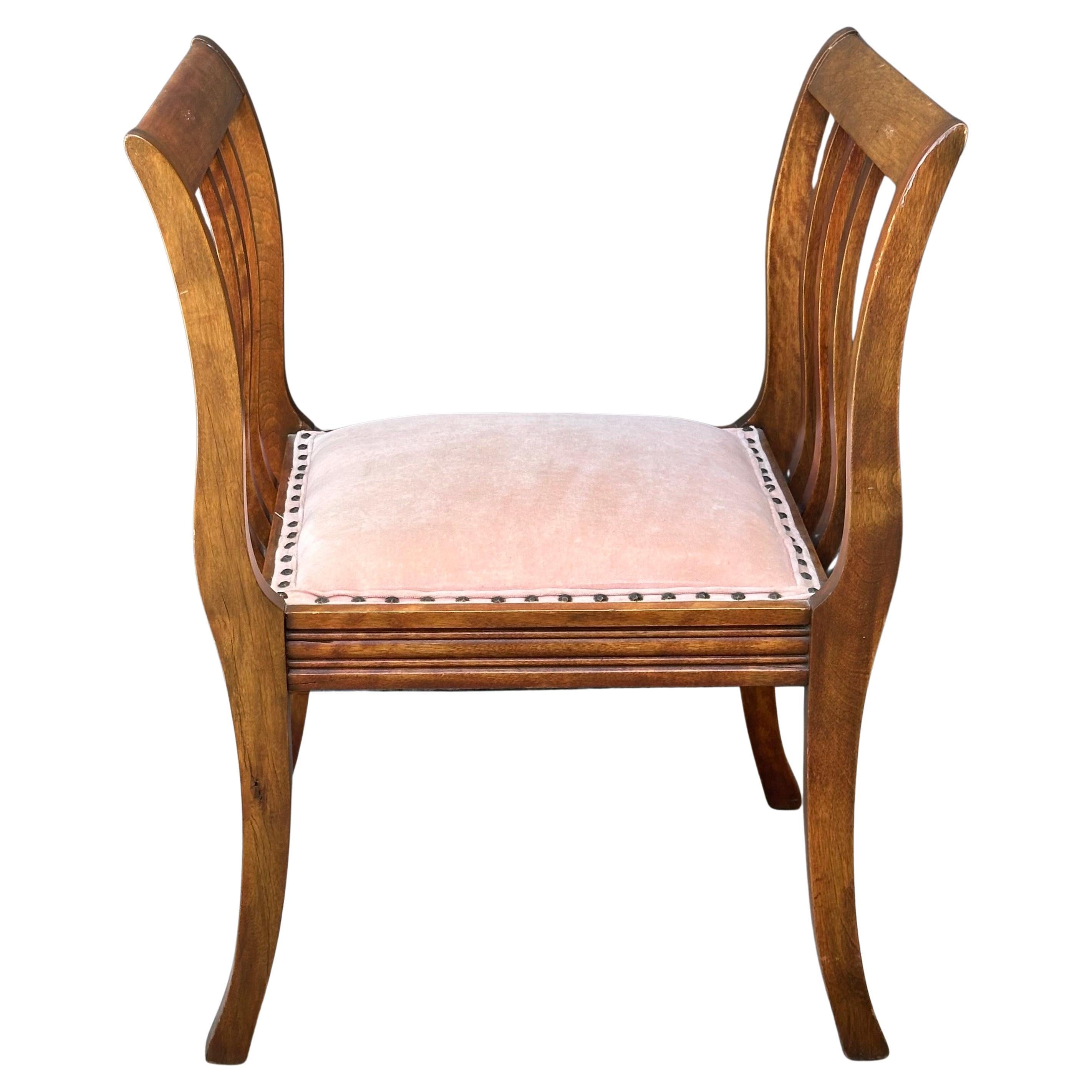 A very nice antique Art Deco high armed single seat bench, circa 1930s.  The bench is in good vintage condition and measures 20