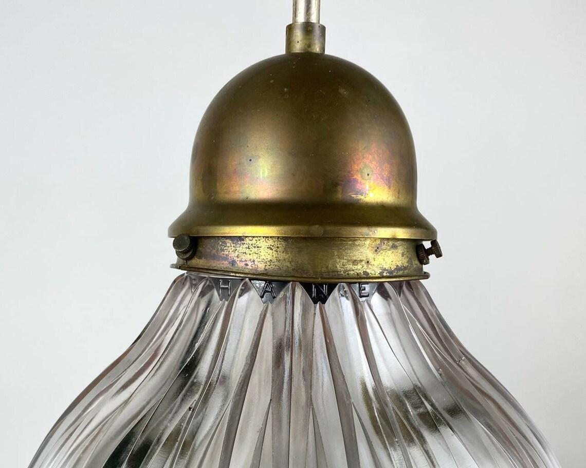 Brass Antique Art Deco Holophane Clear Ribbed Glass Chandelier, 1910s For Sale