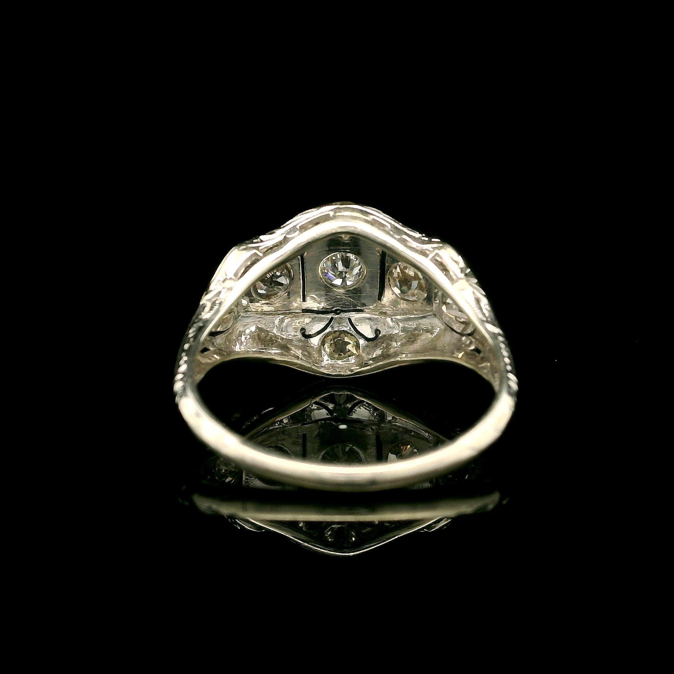 –Stone(s)–
(7) Natural Genuine Diamonds - Old European Cut - Pave Bead Set - 0.60ctw (approx.)
Total Carat Weight: 0.60 (approx.)

Material: Solid 18 White Gold 
Weight: 3.29 Grams
Ring Size: 7.0 ( fitted on finger, please contact us prior to