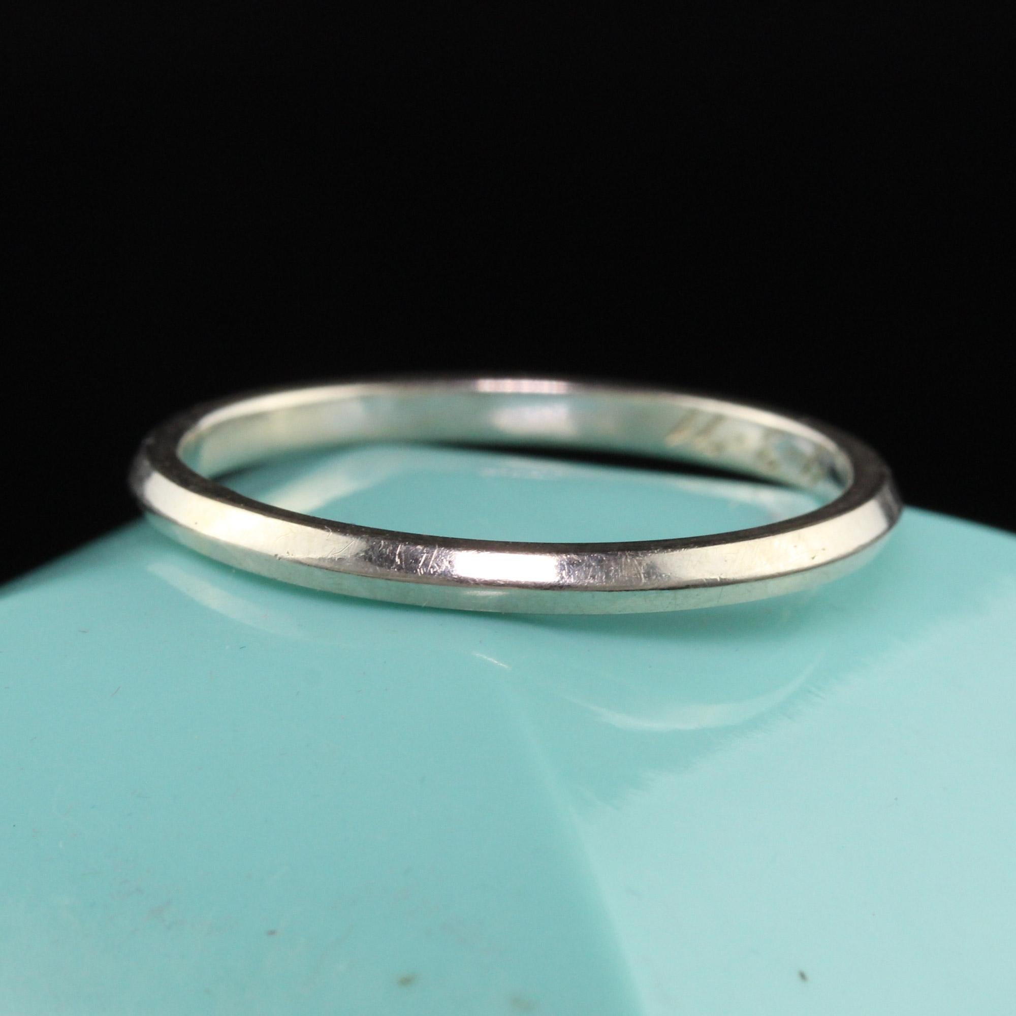 Beautiful Antique Art Deco Jabel Platinum Knife Edge Classic Wedding Band. This classic band is crafted in platinum and is made by Jabel. It has a knife edge design going around the ring. The inside of the band is engraved 