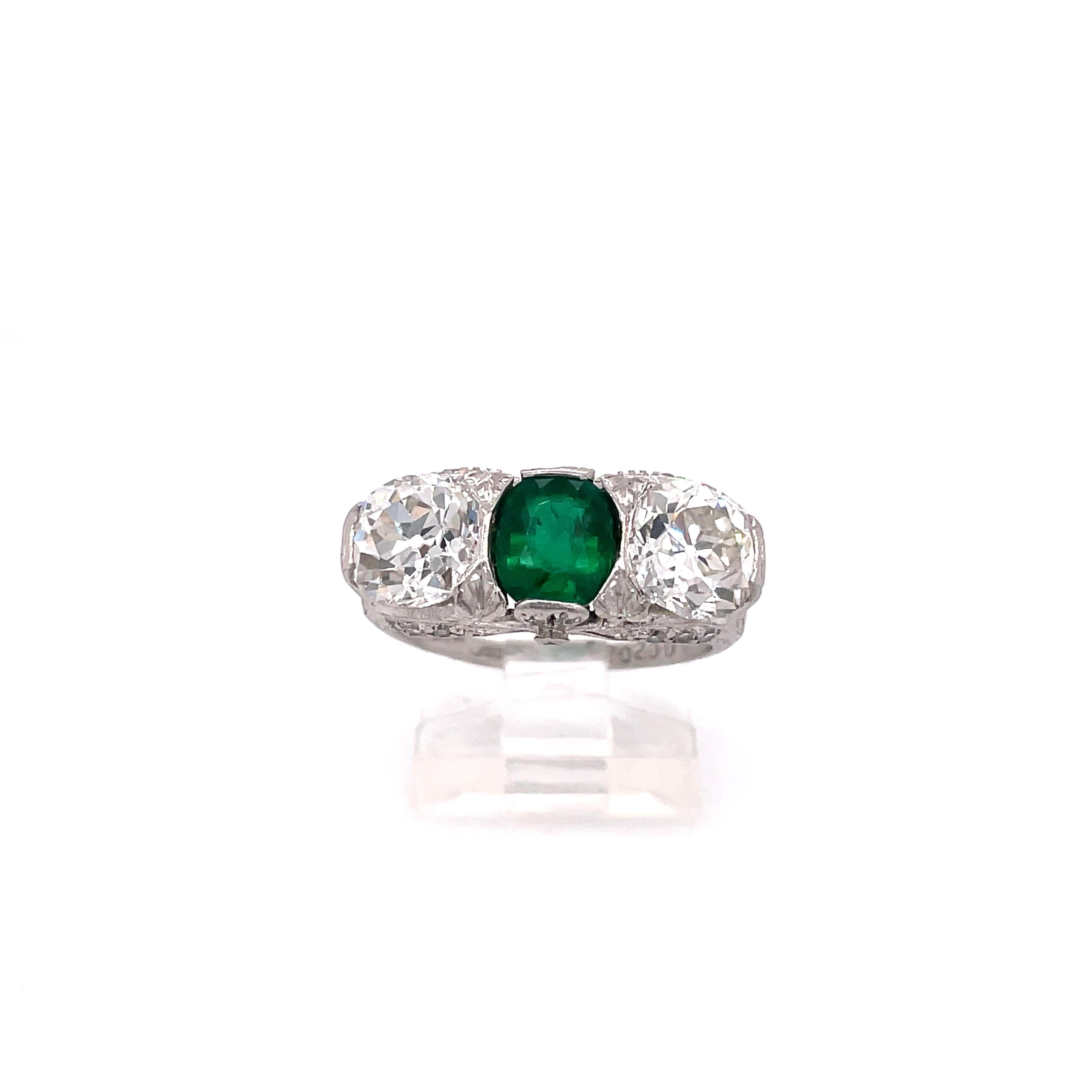 Antique Art Deco J.E. Caldwell Emerald and Diamond Three Stone Platinum Ring In Excellent Condition For Sale In New York, NY