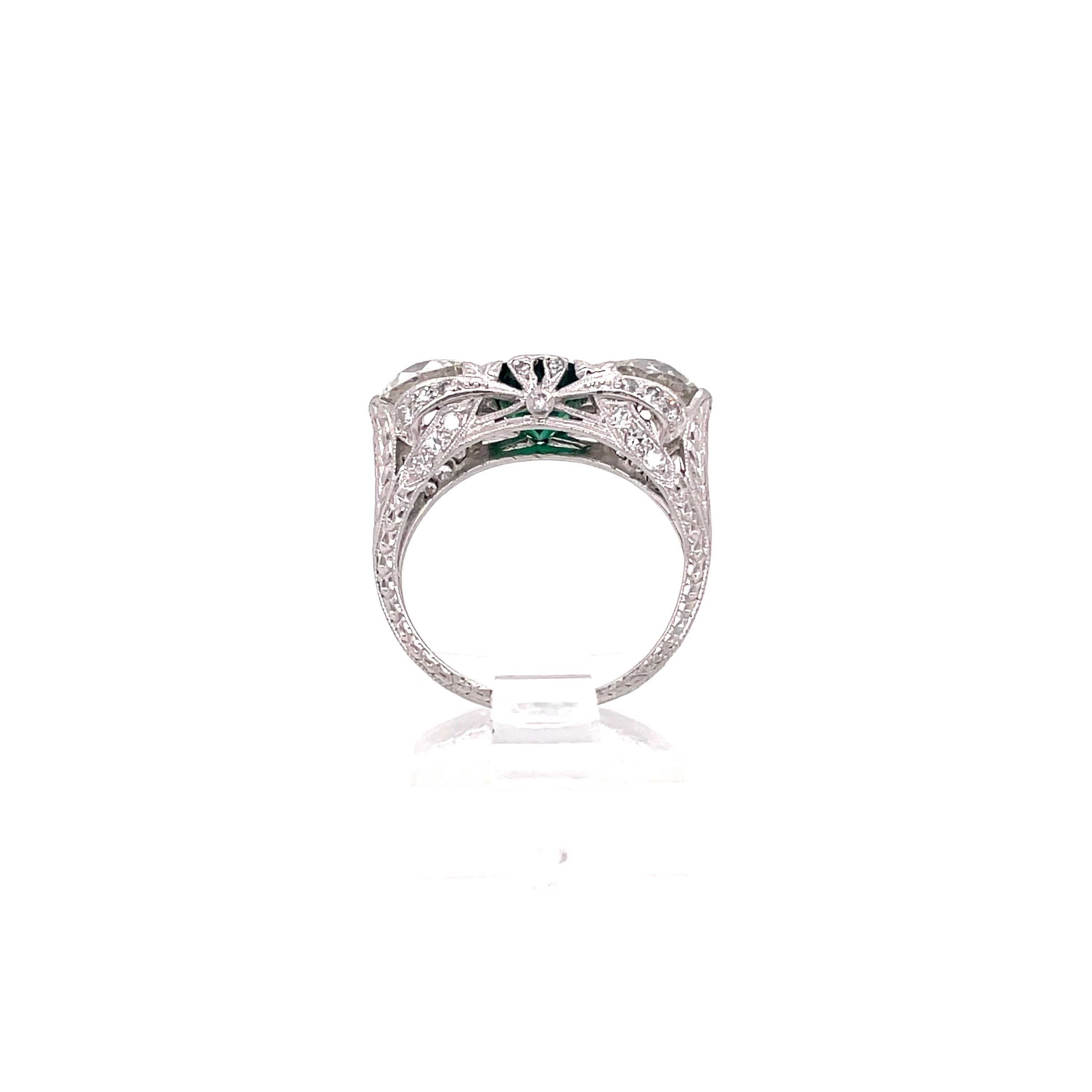 Antique Art Deco J.E. Caldwell Emerald and Diamond Three Stone Platinum Ring For Sale 1