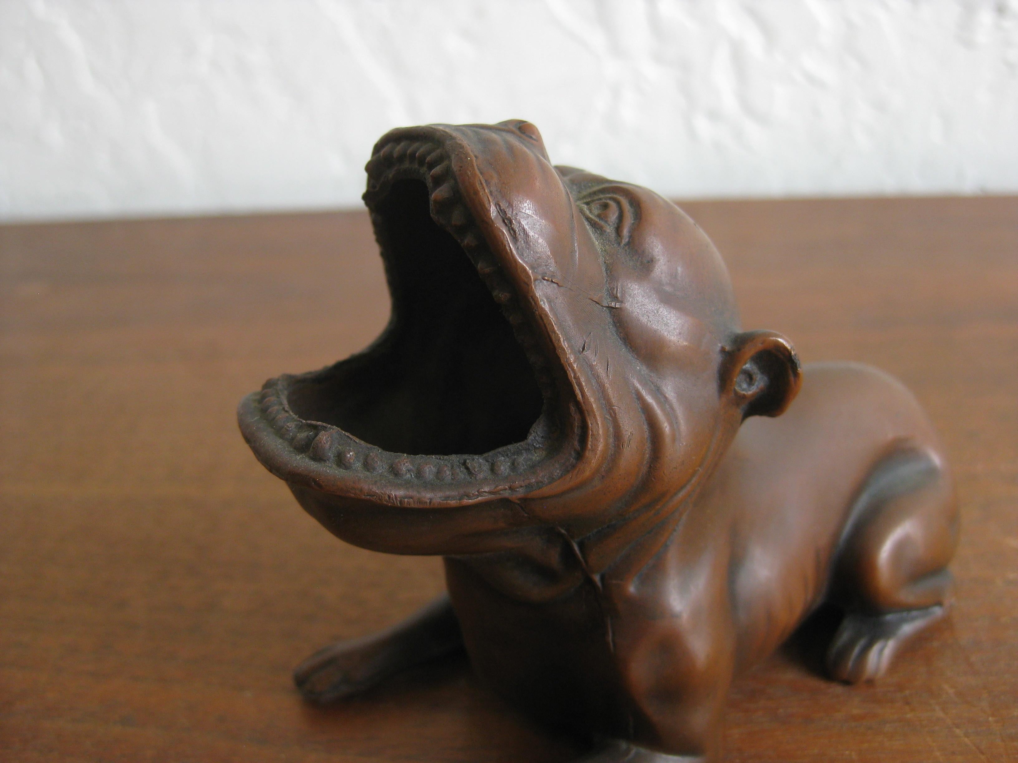 Very unique Art Deco bronze figural bulldog cigar ashtray made by Jennings Brothers, circa 1920s. Great shape and design. Made of spelter with a bronze finish. Signed on the bottom by the maker. In excellent antique condition.