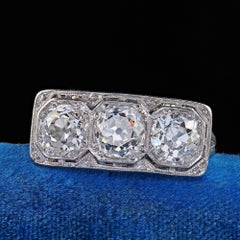Antique Art Deco Jung & Klitz Platinum Old Mine Cut Diamond Three Stone Ring