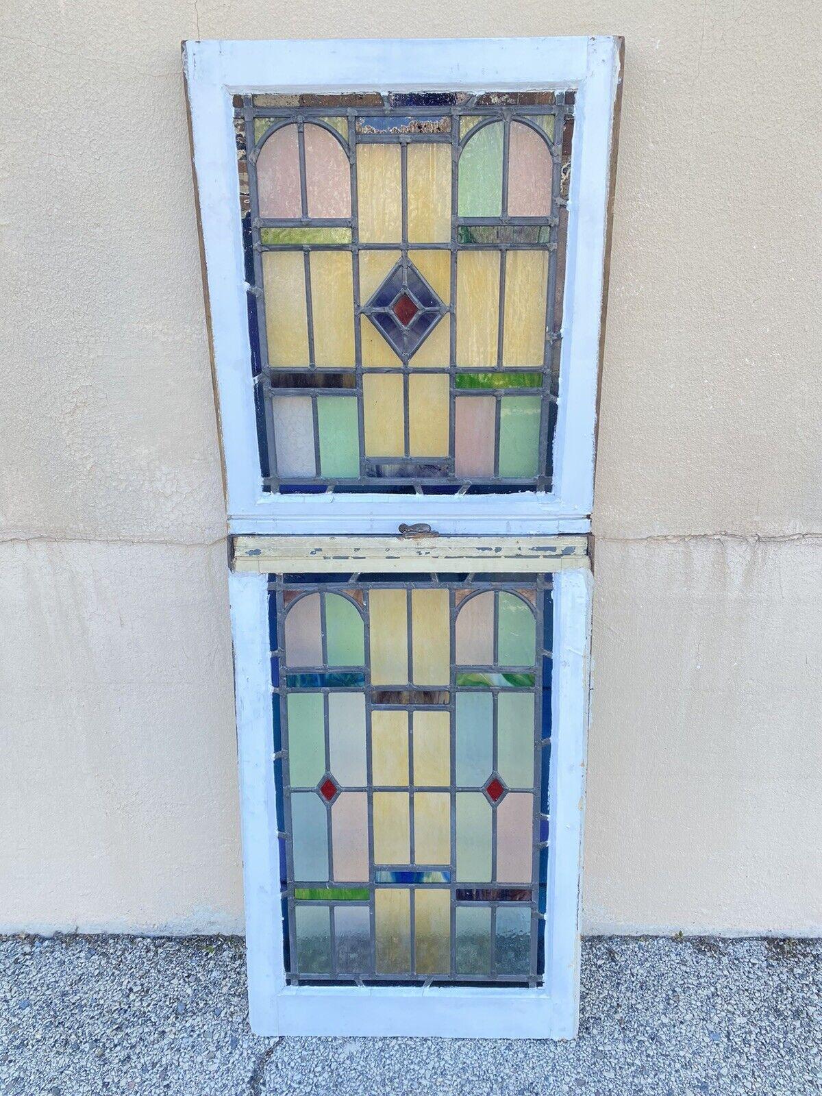 Antique Art Deco Leaded Stained Glass Pink Green Blue Yellow Windows - (2) Pair. Item features wonderful pink, green, blue, and yellow Art Deco stained glass, white painted exterior wooden frames, brown wooden interior frames. Listing includes (2)